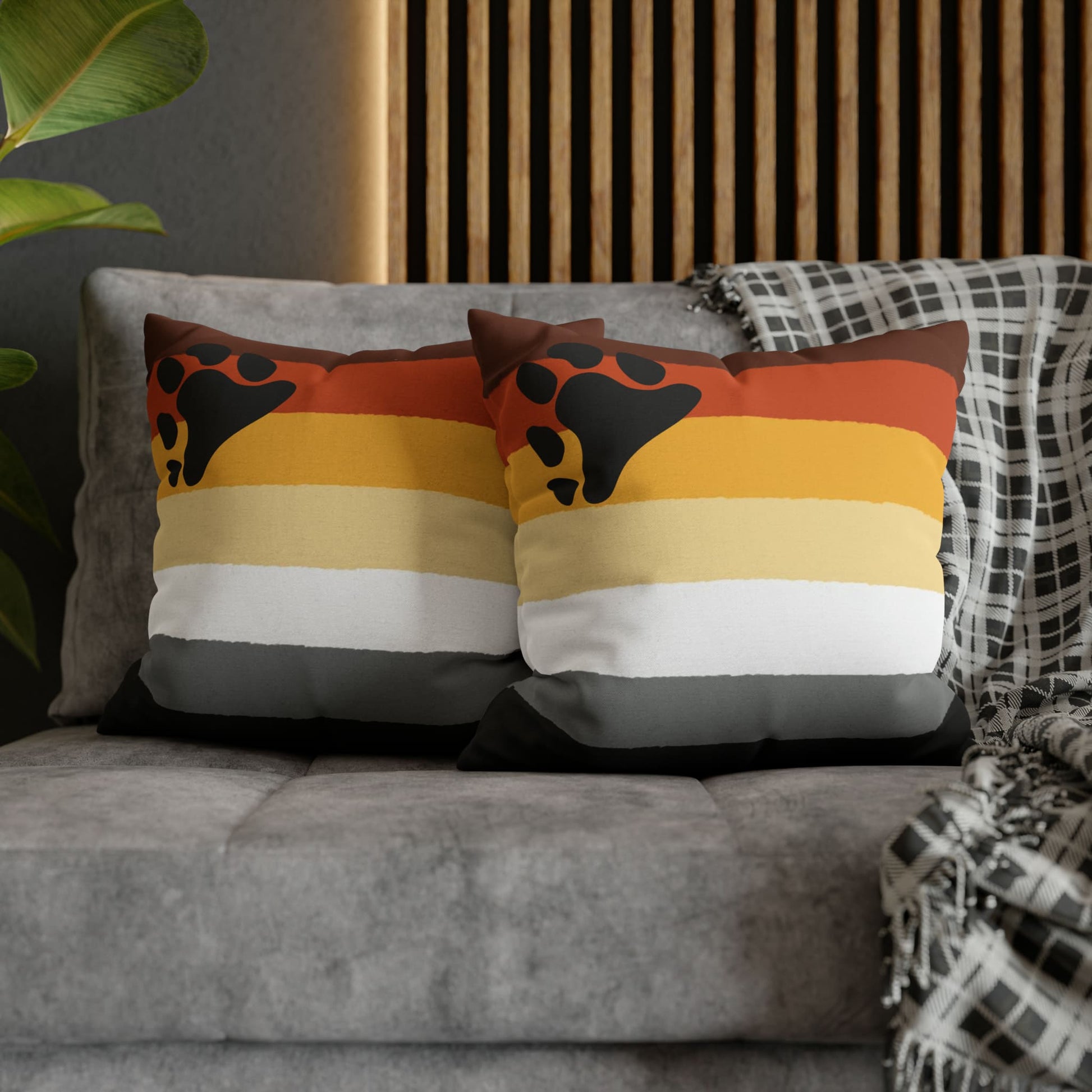 2 bear pride pillows on couch
