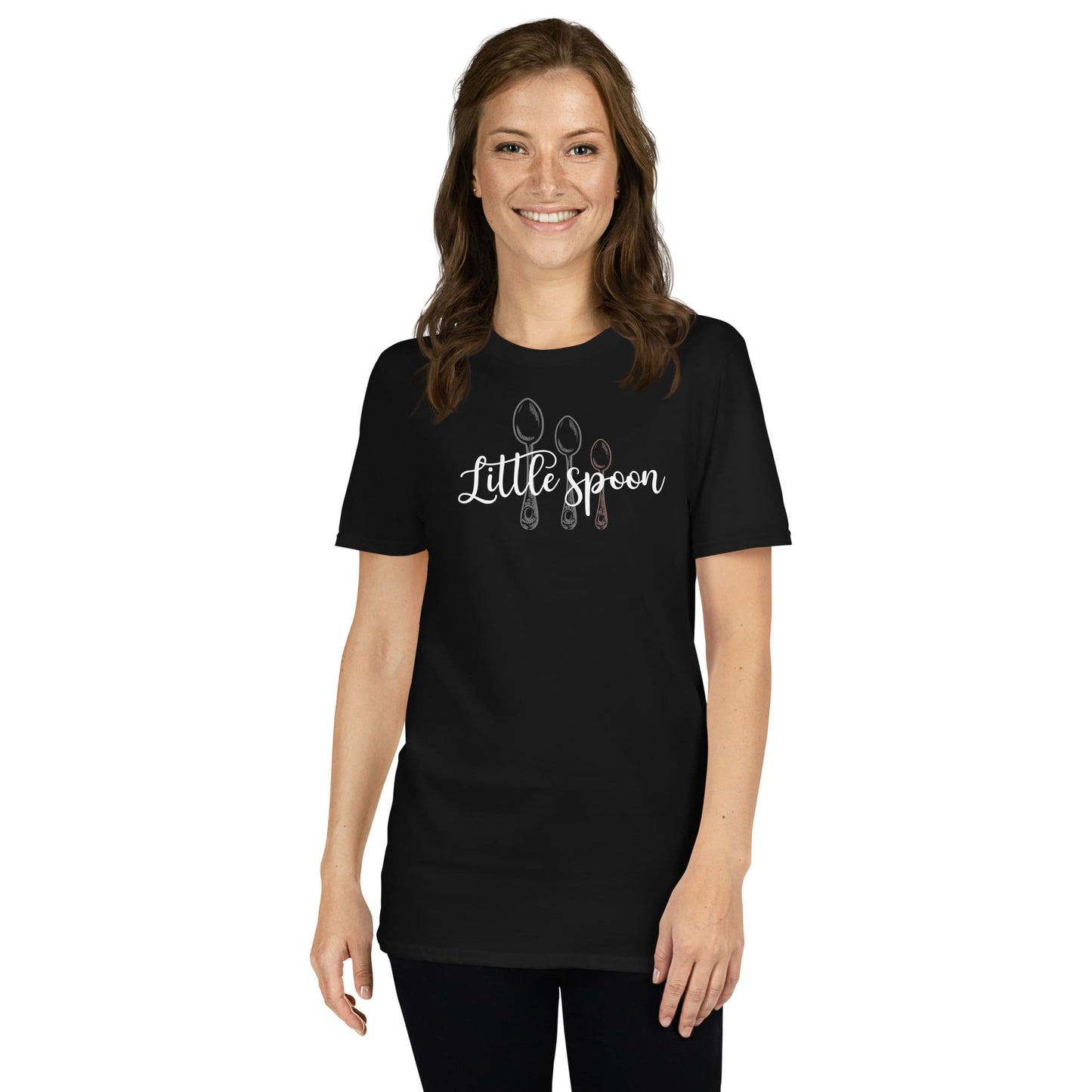 Woman wearing a black ENM polyamory t-shirt with 'Little spoon' design on a white background