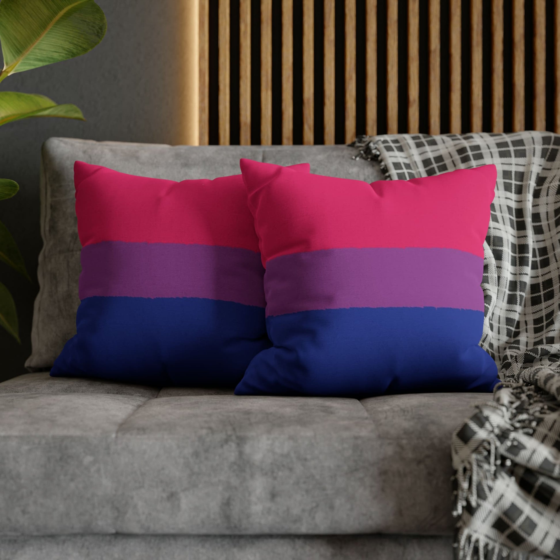 2 bisexual pillows on couch 