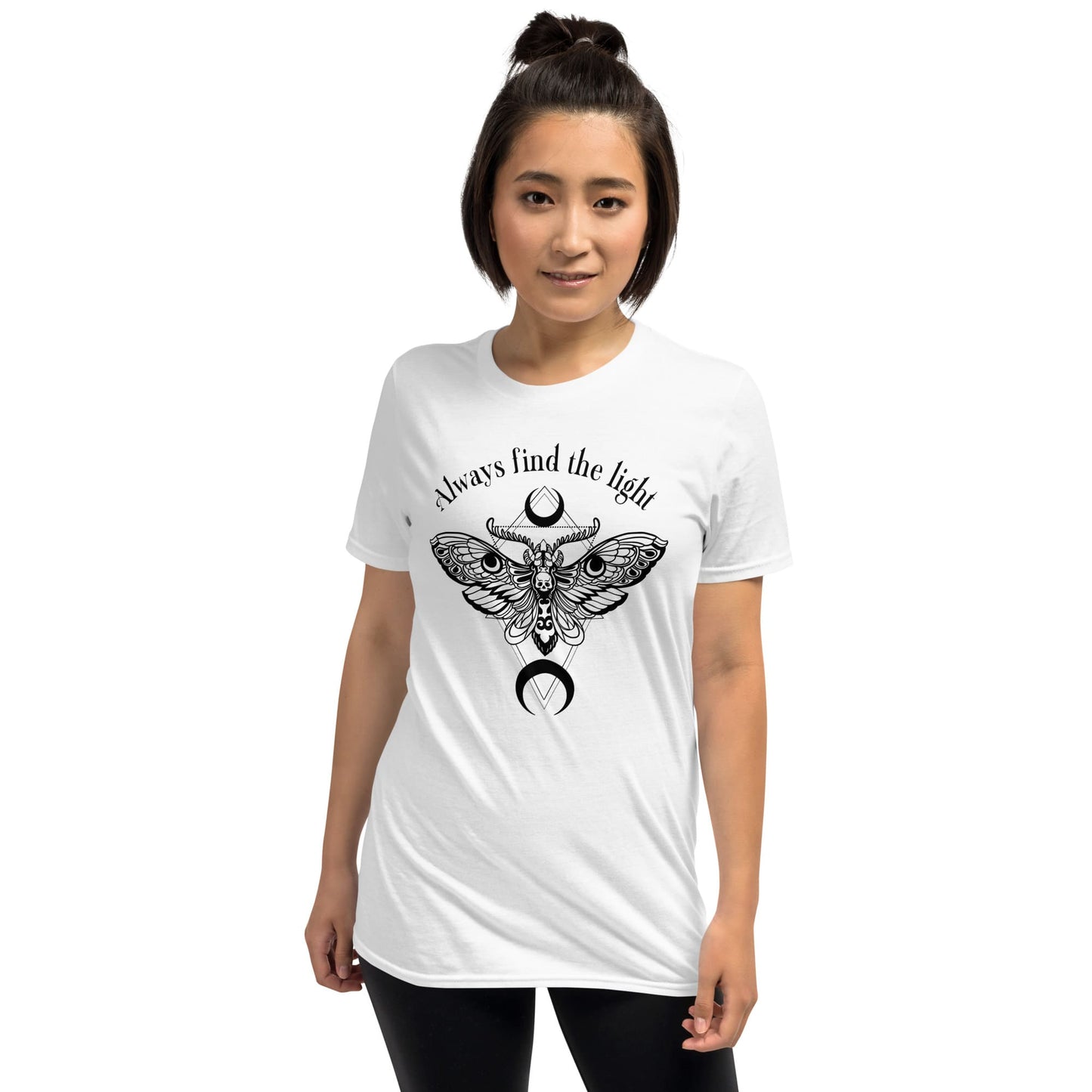 Woman wearing a white inspirational t-shirt with a black butterfly design and text on a white background