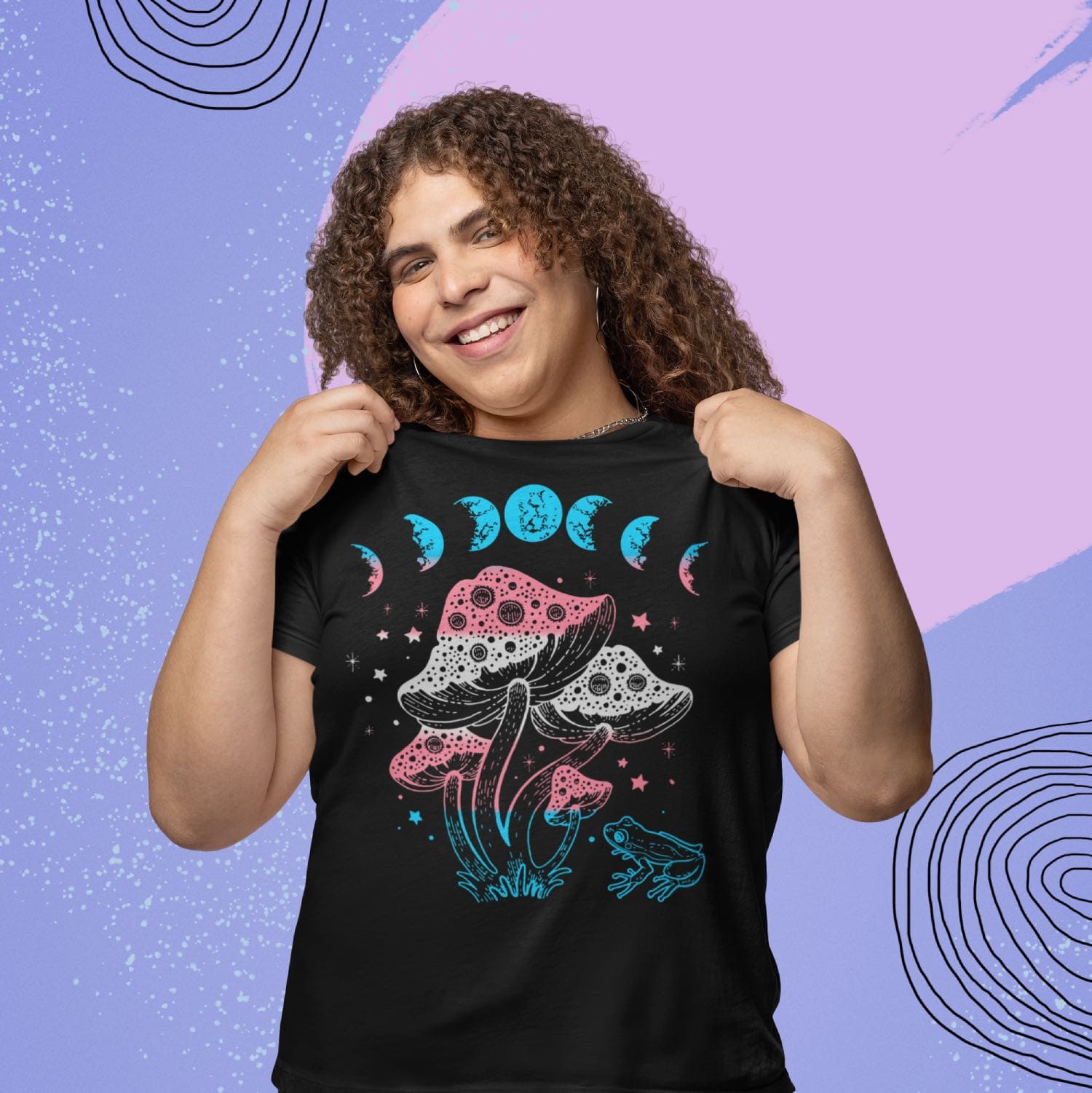 transgender shirt, cottagecore design with frog, mushrooms and moon phases, in use