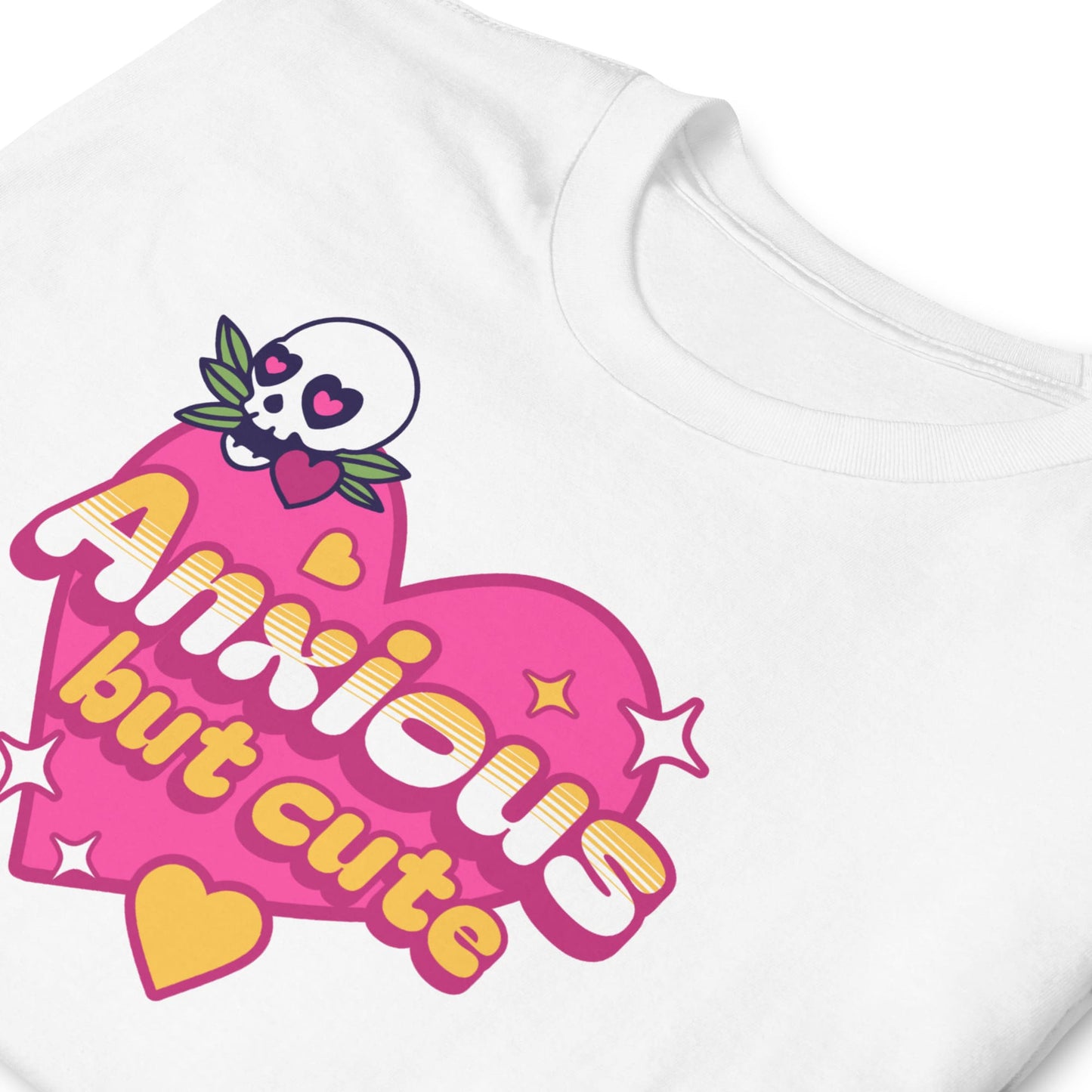 White sweatshirt with a pink and yellow graphic design featuring a skull and text on a white background: Cute Anxiety Shirt, Pastel Goth Mental Health Tee, Kawaii Gothic Aesthetic, Neurodivergent E-Girl T-Shirt, Emo Autism Gift For Neurospicy