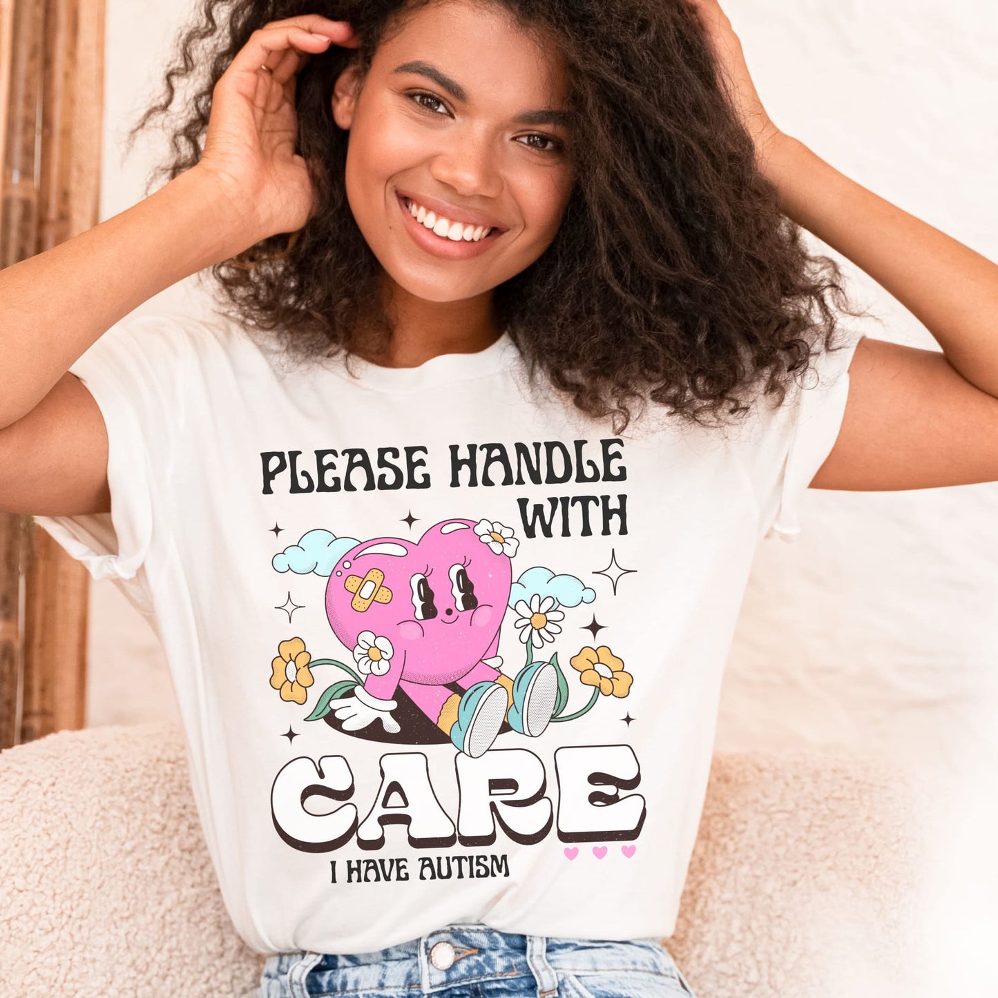 Person wearing a white t-shirt with a heart graphic and text, sitting on a couch: Cute Autism Shirt, Retro Neurospicy Tee For Autistic, Neurodivergent T-Shirt, AuDHD Awareness, Mental Health Top Visibility Gift For Warrior