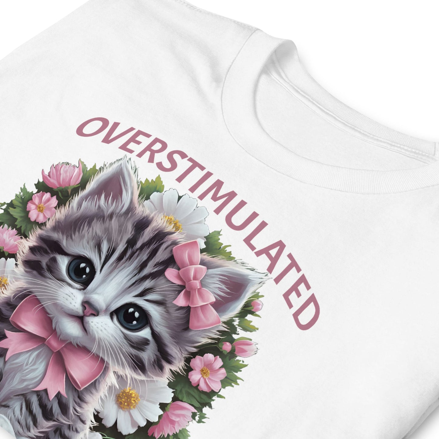 White t-shirt with a kitten graphic and 'OVERSTIMULATED' text on a white background: Overstimulated Shirt, Neurodiversity Tee, ADHD Burnout Tshirt, Autism Awareness, Gift For Neurospicy Autistic, Cute Pink Bow Cat T-Shirt