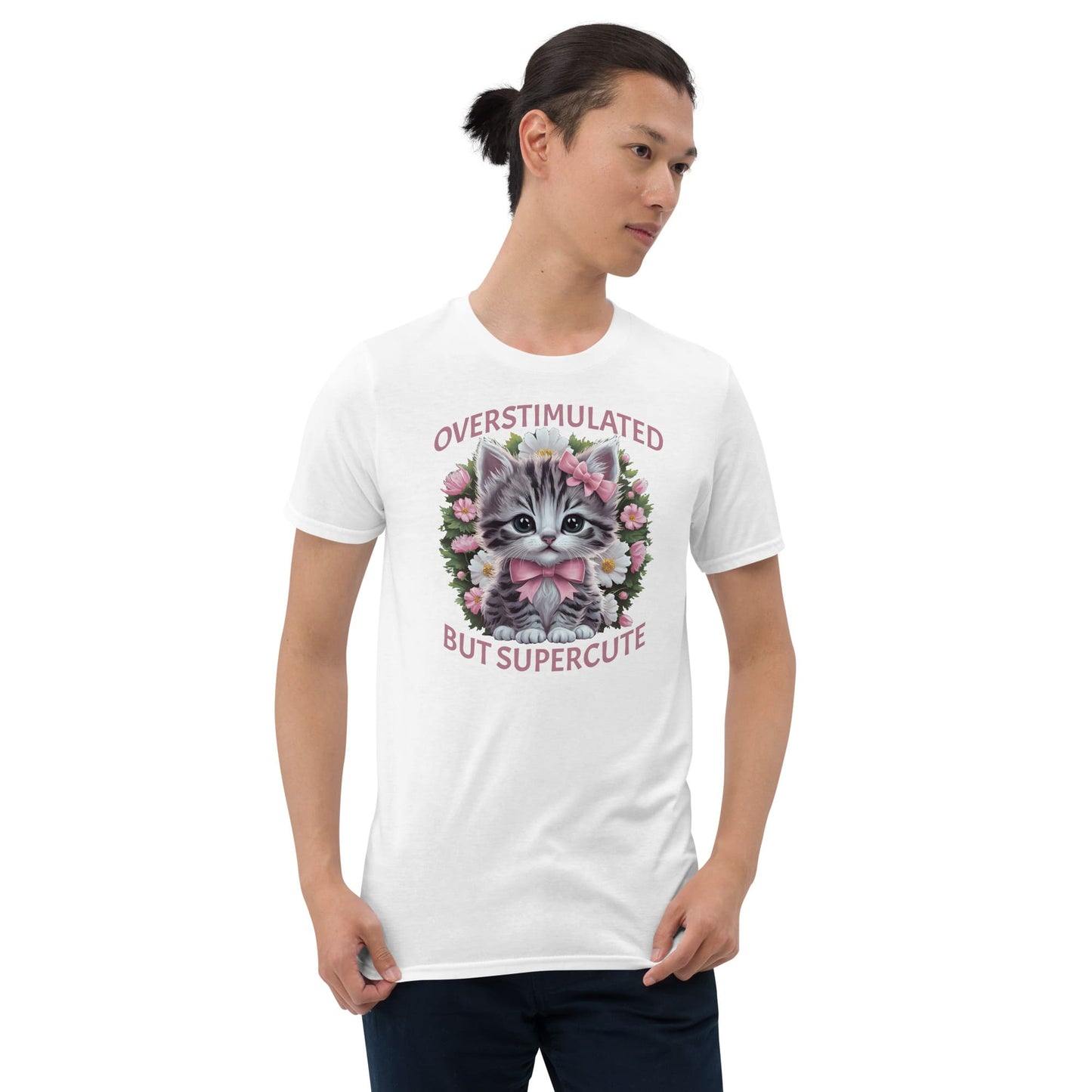 Person wearing a white t-shirt with a kitten graphic and text on a white background: Overstimulated Shirt, Neurodiversity Tee, ADHD Burnout Tshirt, Autism Awareness, Gift For Neurospicy Autistic, Cute Pink Bow Cat T-Shirt