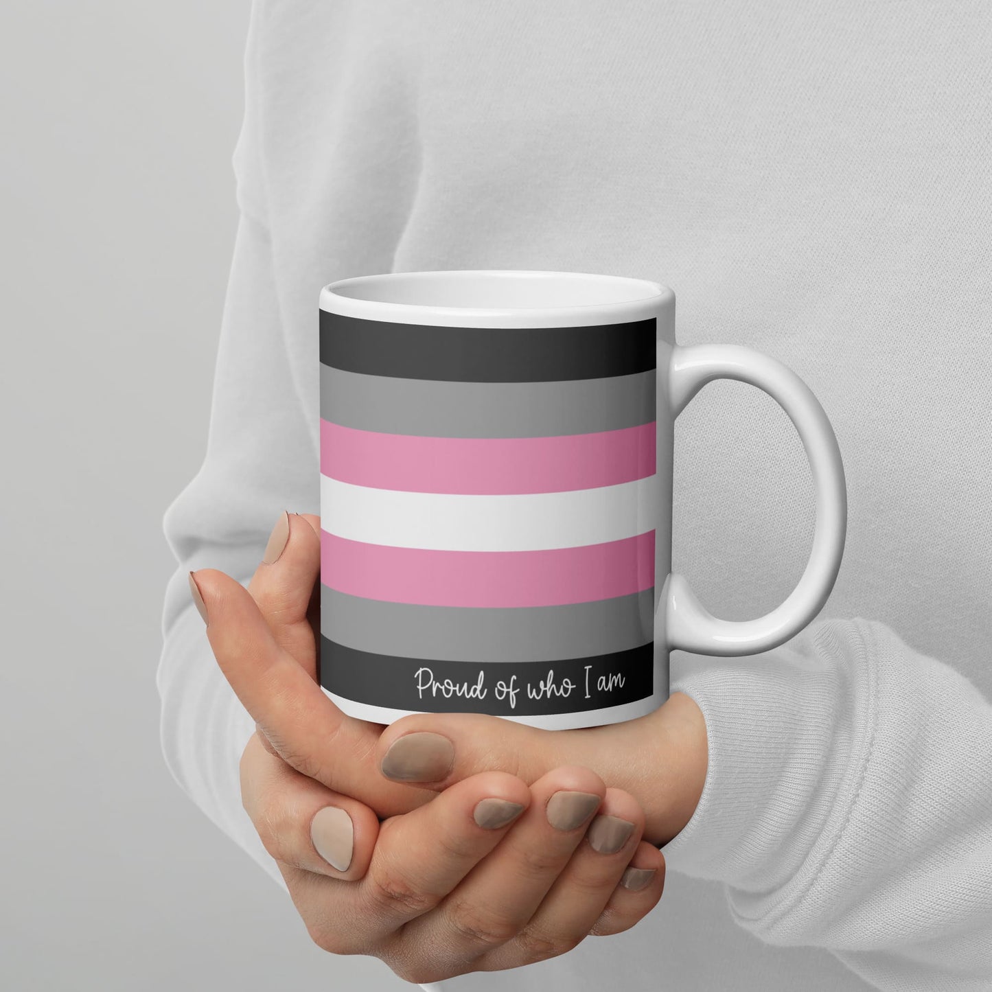 demigirl coffee mug on hands