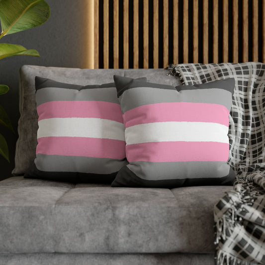 2 demigirl pillows on couch