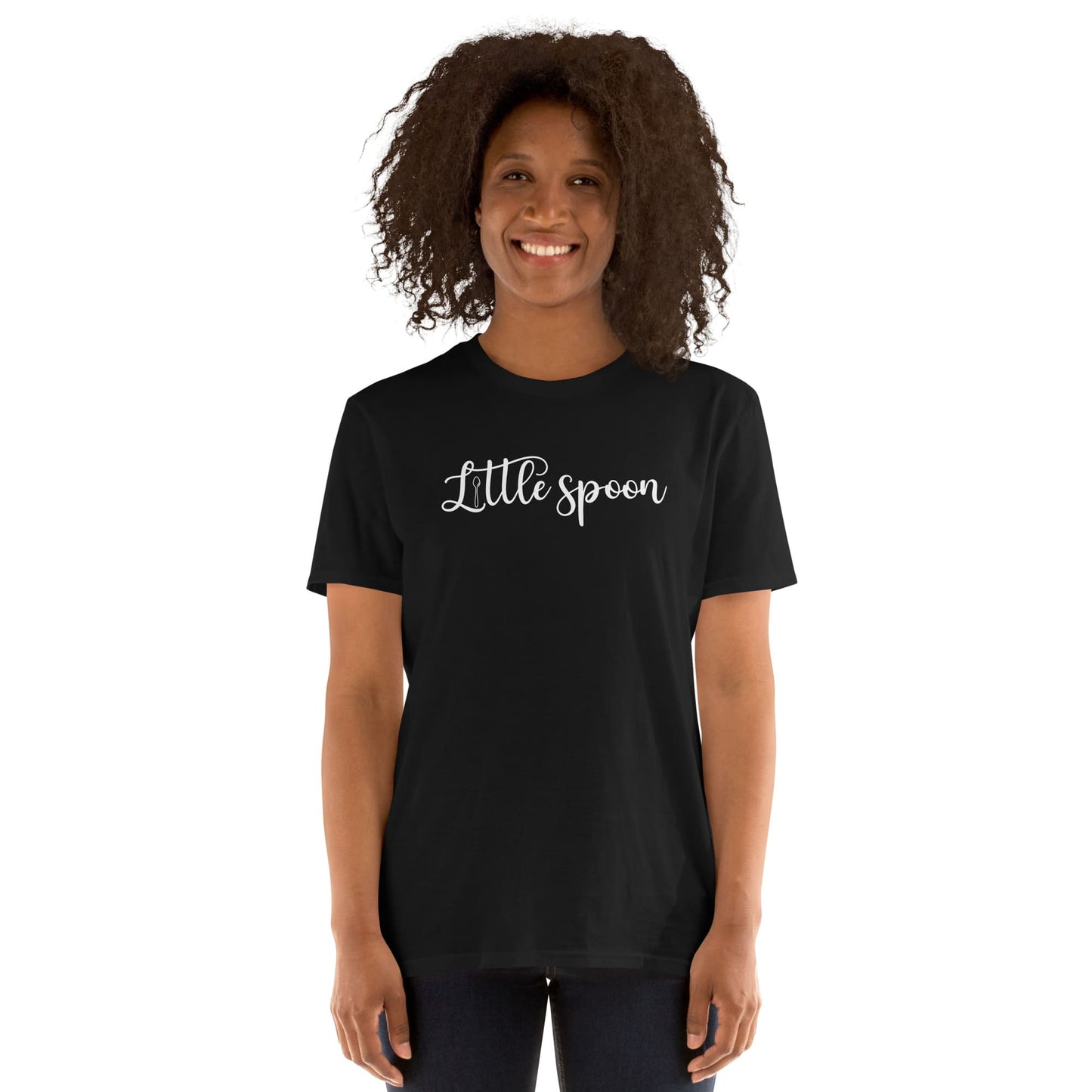 Person wearing a black polyam pride t-shirt with 'Little spoon' ENM text on a white background