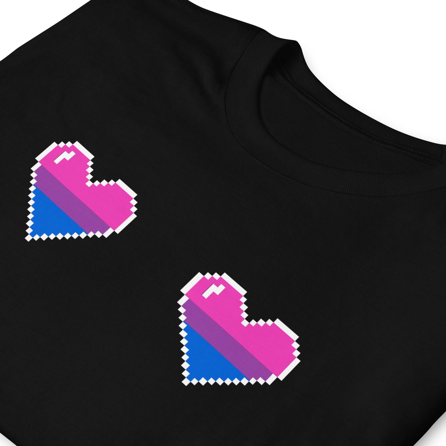 Black shirt with pixelated bi pride heart designs on a white background