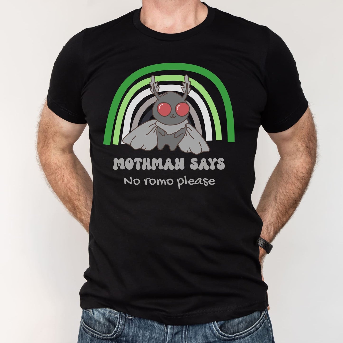 Black t-shirt with Mothman graphic and text on a plain background: Aromantic Mothman Shirt, Funny Aro Pride Cryptid Tee, Folklore Mythology T-Shirt, Queer Cryptozoology Gift, Cryptidcore Weird Stuff, LGBTQ