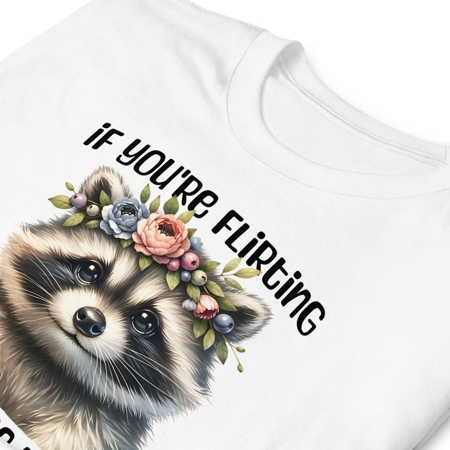 White t-shirt with a raccoon graphic and floral crown and text 'IF YOU'RE FLIRTING' on a white background: Subtle Neurodivergent Shirt, Autism Awareness Tee, ADHD AuDHD Warrior T-Shirt, Cute Raccoon Shirt For Neurospicy, Neurodivergent Gift