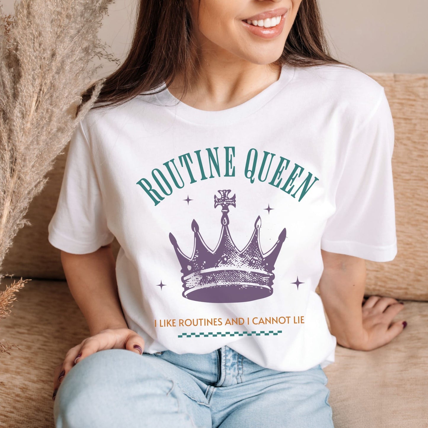 Person wearing a white t-shirt with 'Routine Queen' design sitting on a couch: Funny Autistic Queen Shirt, I Like Routines and I Cannot Lie, Fun & Empowering Tee for Neurodivergent, Autism Pun T-Shirt For Neurospicy