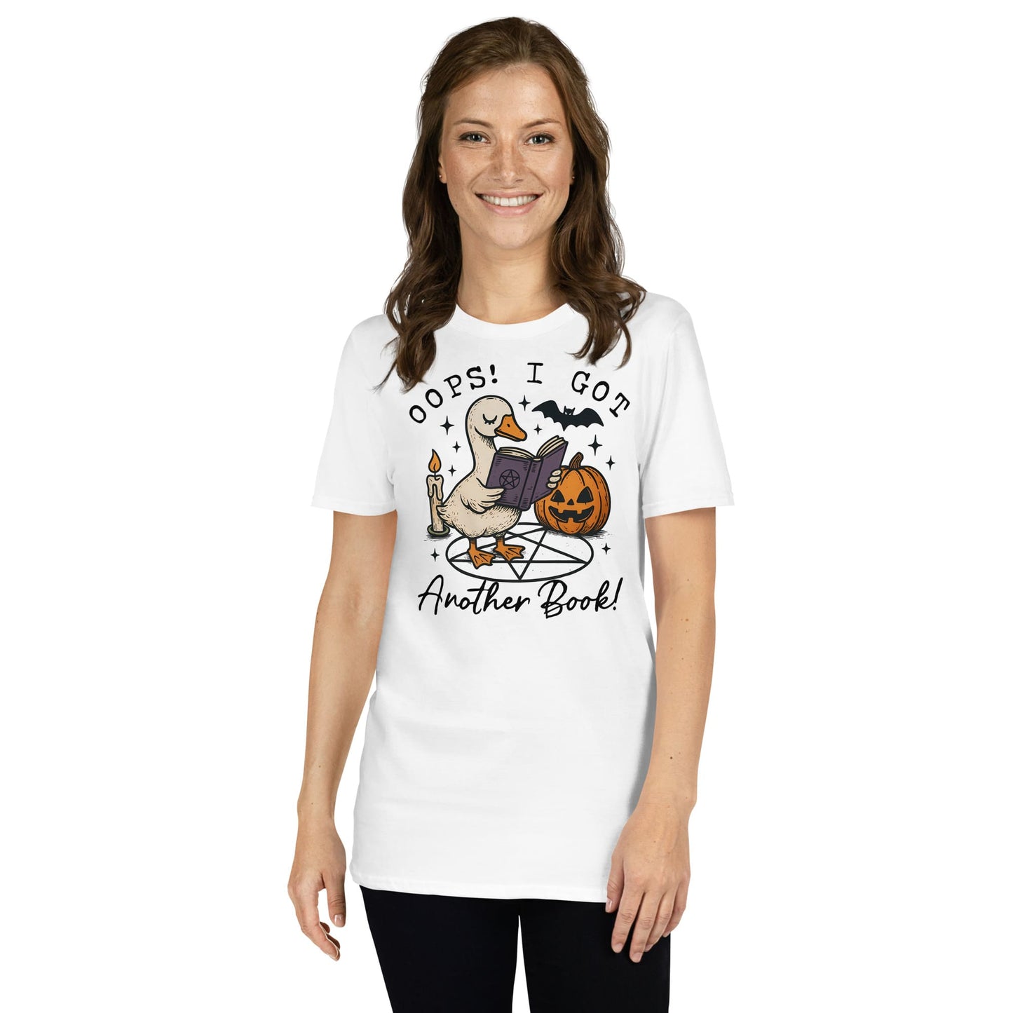 Woman wearing a white t-shirt with a graphic design and text on a white background: Funny Bookish Goose Shirt, Spooky Season Book Tee, Fall Library T-Shirt, Reading Gift For Halloween Lover Cute Trick Or Treat Teacher Outfit