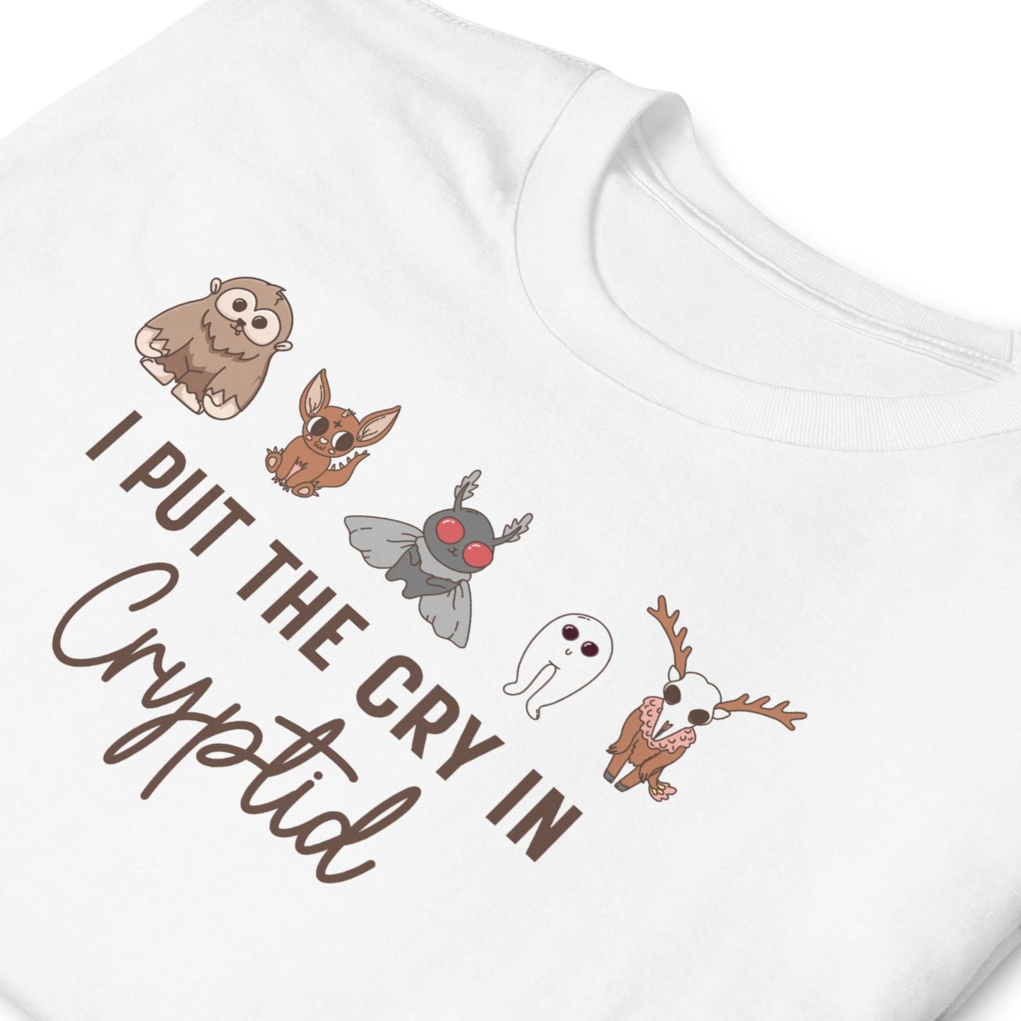 White t-shirt with cryptid creature illustrations and text on a white background: Funny Cryptid Mental Health Awareness Comfort Colors Shirt, Cute Cryptidcore Neurodivergent Tee, Kawaii Cryptozoology Neurospicy T-Shirt