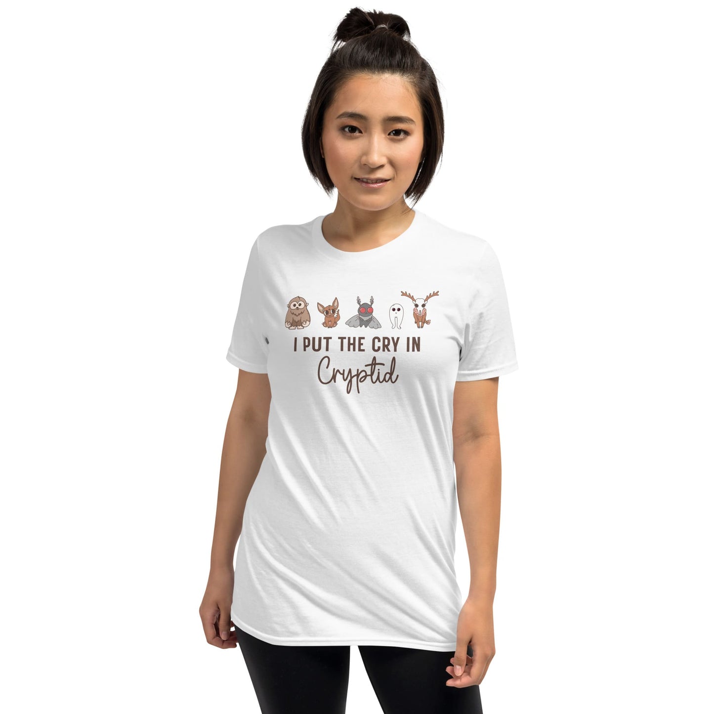 Person wearing a white t-shirt with cartoon characters and text on a white background: Funny Cryptid Mental Health Awareness Comfort Colors Shirt, Cute Cryptidcore Neurodivergent Tee, Kawaii Cryptozoology Neurospicy T-Shirt