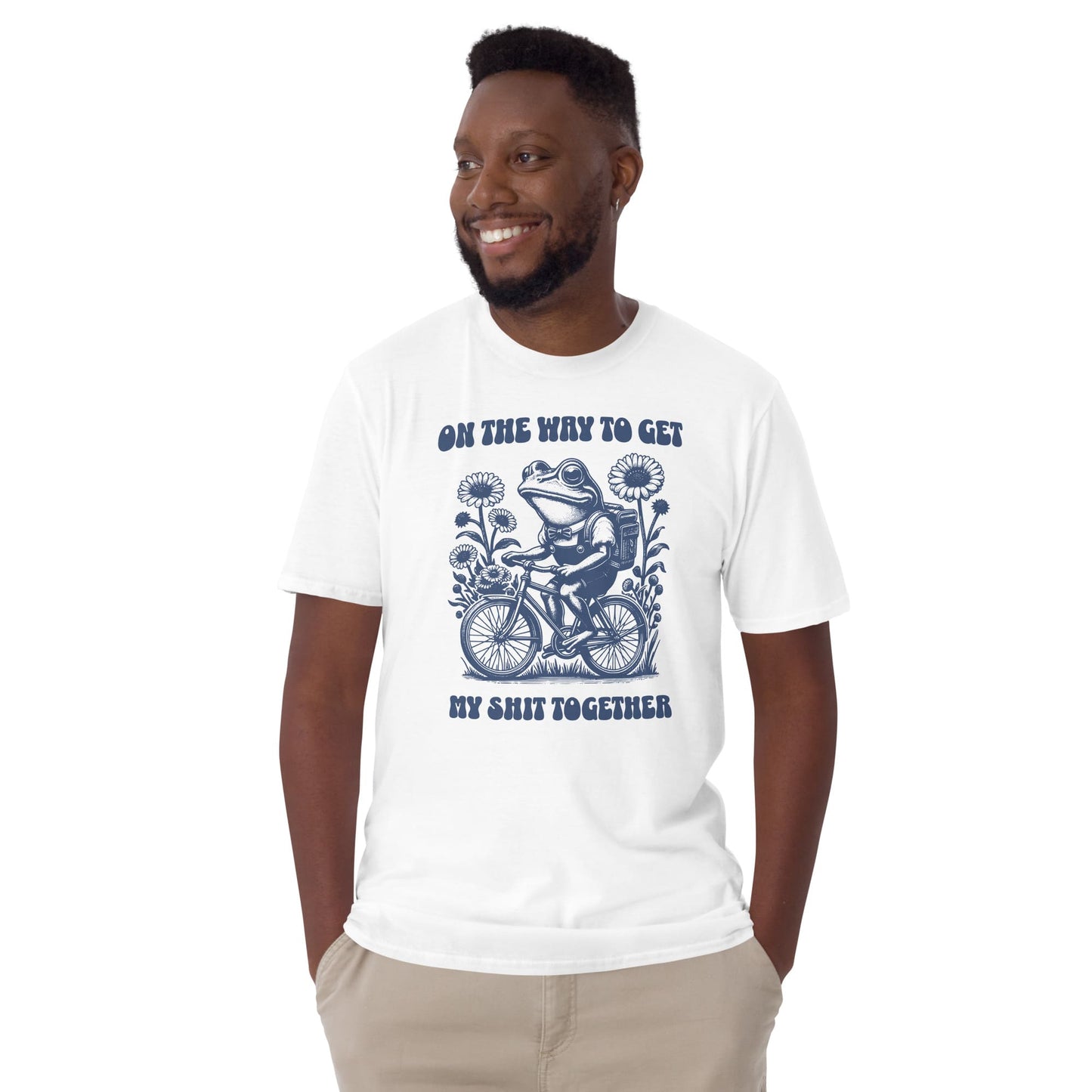 Man wearing a white t-shirt with a graphic design and text on a white background: Funny Neurodivergent Shirt, ADHD AuDHD Tee, Mental Health T-Shirt, Vintage Frog, Sarcastic Adult Humor, On The Way To Get My Shit Together
