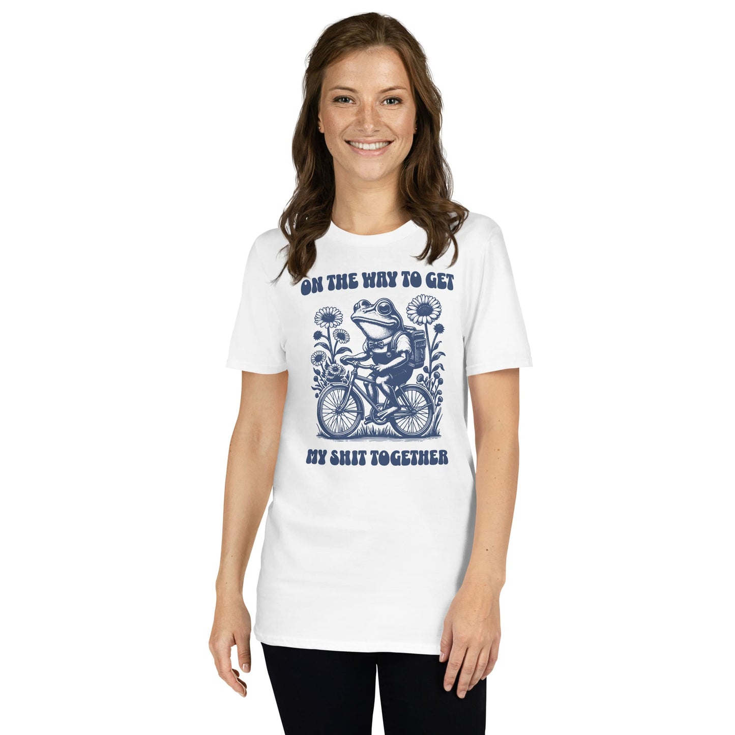 Woman wearing a white t-shirt with a graphic design and text on a white background: Funny Neurodivergent Shirt, ADHD AuDHD Tee, Mental Health T-Shirt, Vintage Frog, Sarcastic Adult Humor, On The Way To Get My Shit Together