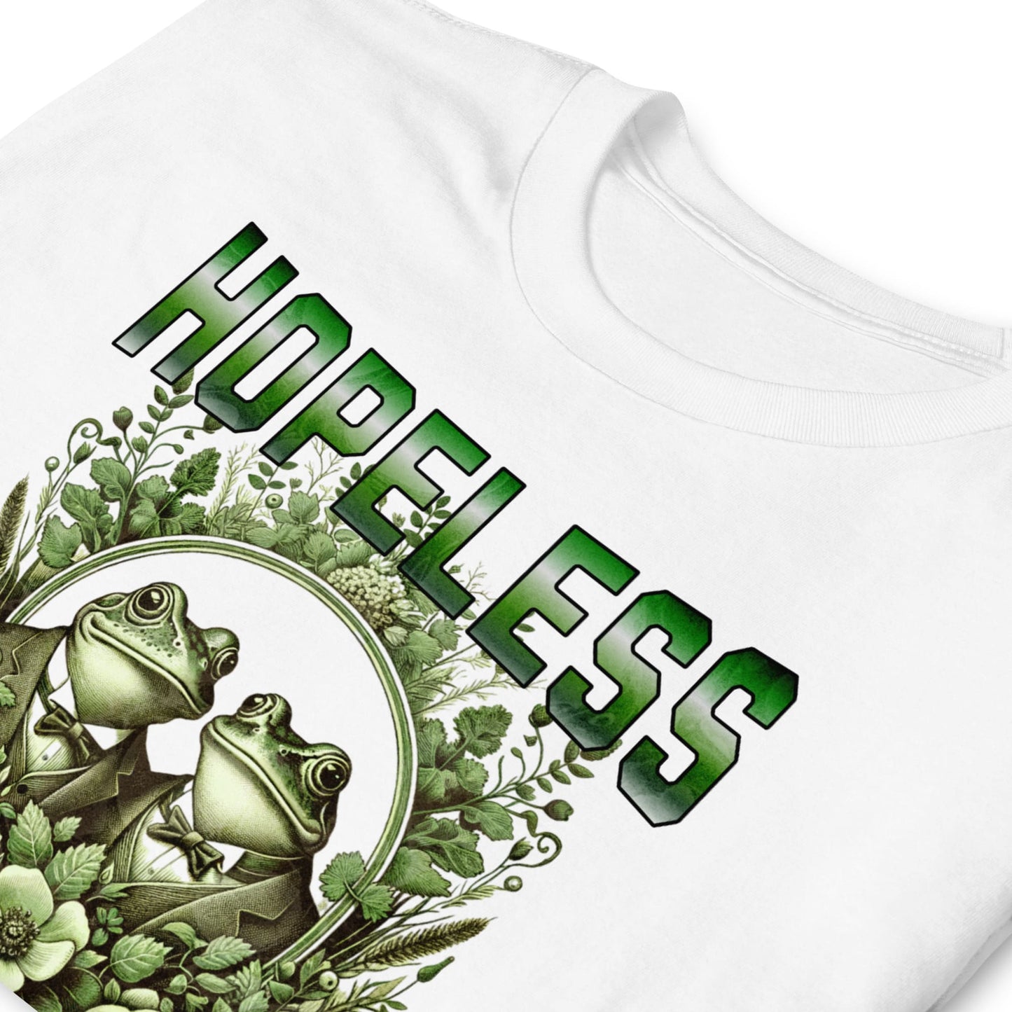 White t-shirt with green frog design and 'HOPELESS aromantic' text on a white background