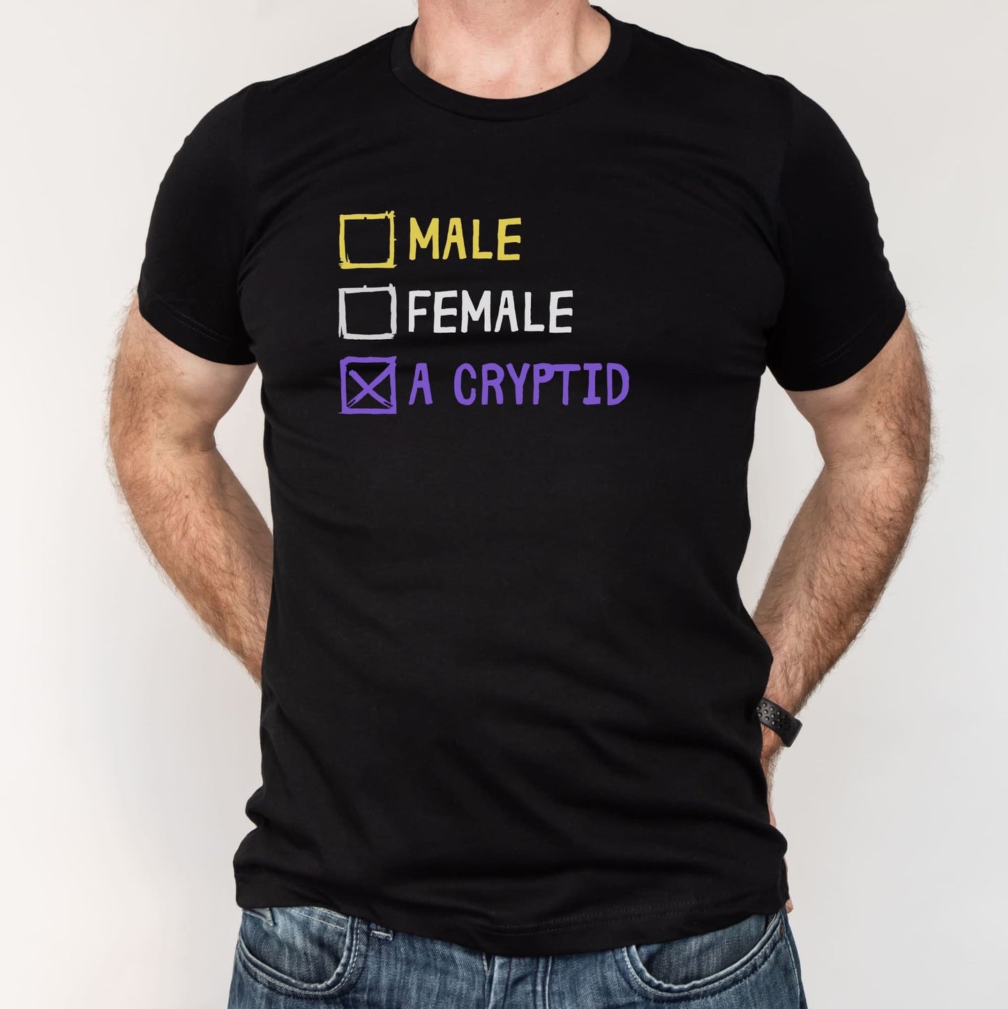 Black t-shirt with gender options and 'A Cryptid' text on a plain background: Funny Nonbinary Shirt, Enby Pride Cryptid Tee, LGBTQ Queer Meme T-Shirt, Cryptidcore Mythology Legend, Weirdcore Gift, Cryptozoology Top