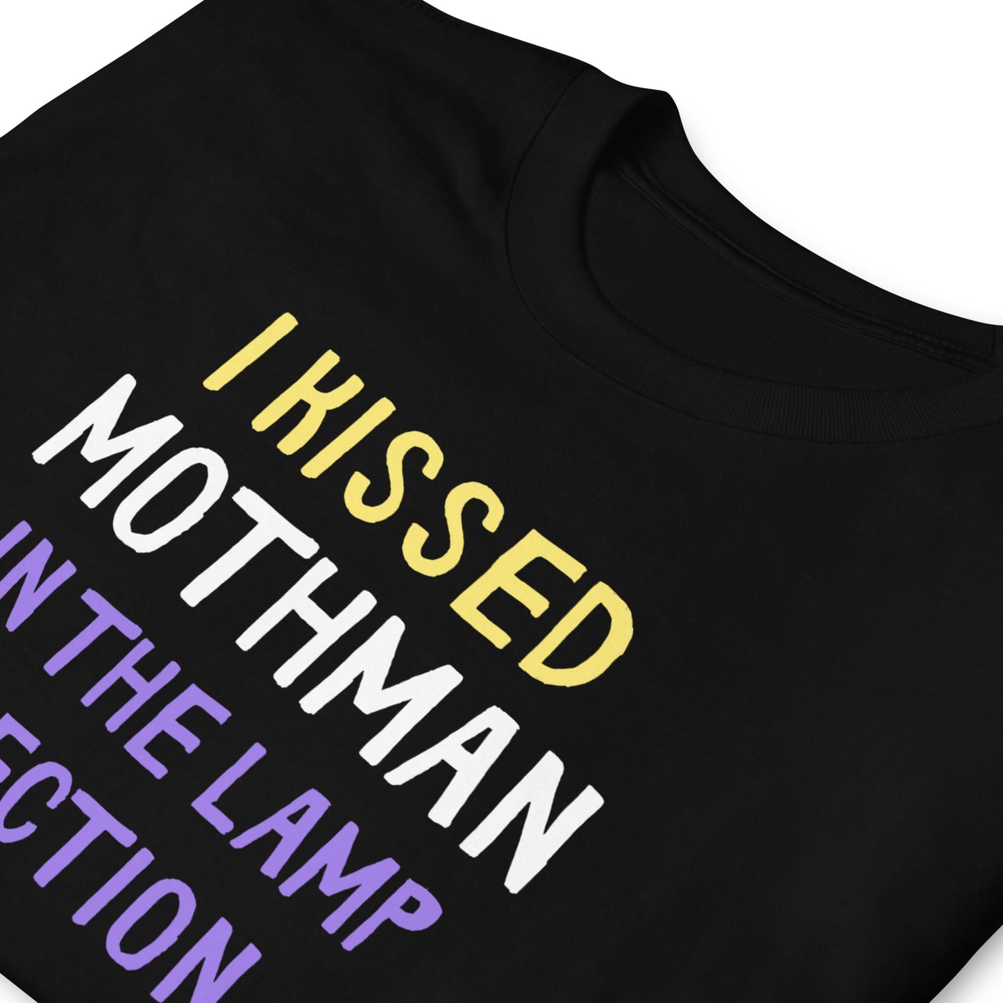 Black t-shirt with colorful text design on a white background: Nonbinary Humor Shirt, Funny Mothman Cryptid Tee, Spooky Queer Pride Gift, LGBTQ Meme T-Shirt ,Enby Weirdcore Top, Cryptidcore Mythology