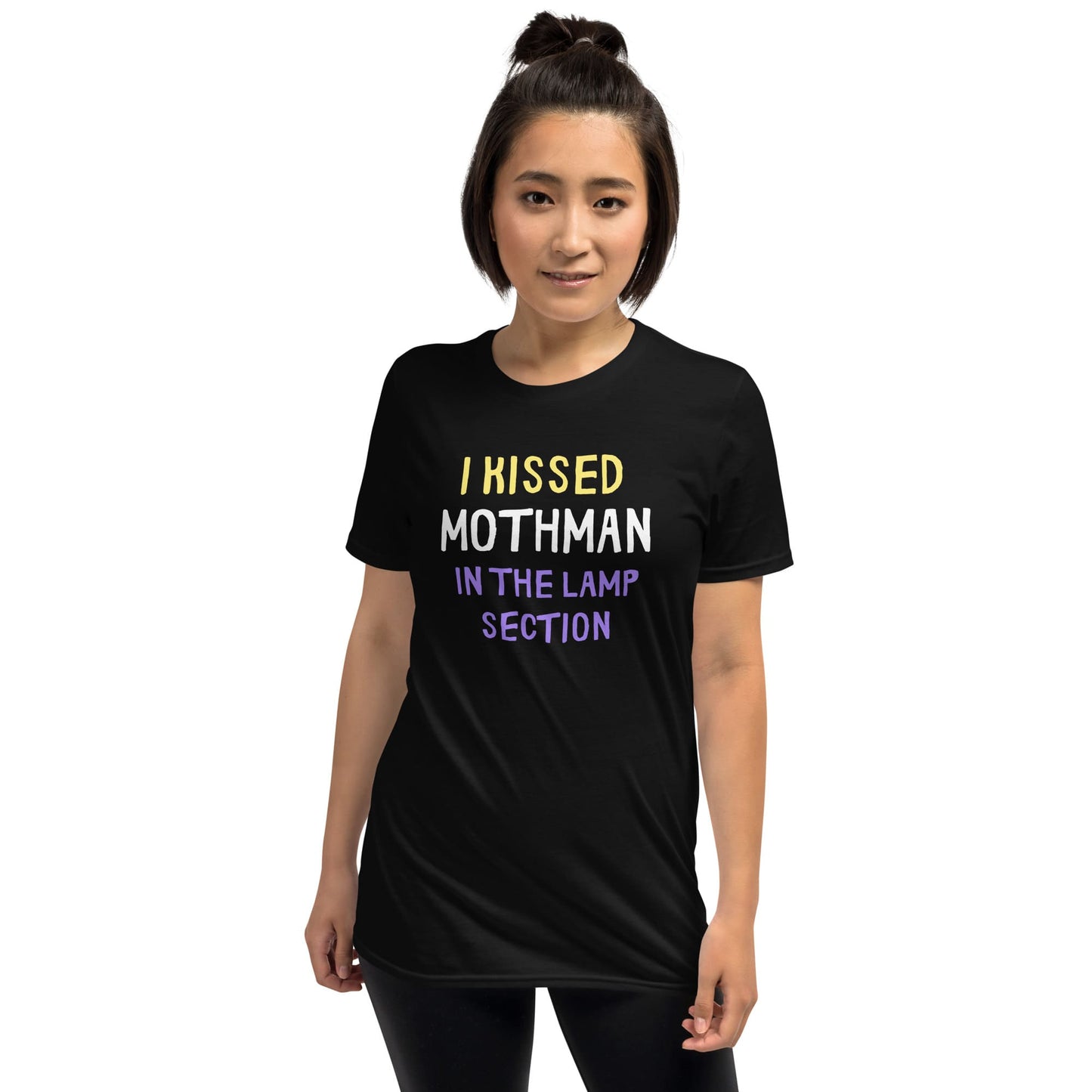 Person wearing a black t-shirt with humorous text design on a white background: Nonbinary Humor Shirt, Funny Mothman Cryptid Tee, Spooky Queer Pride Gift, LGBTQ Meme T-Shirt ,Enby Weirdcore Top, Cryptidcore Mythology