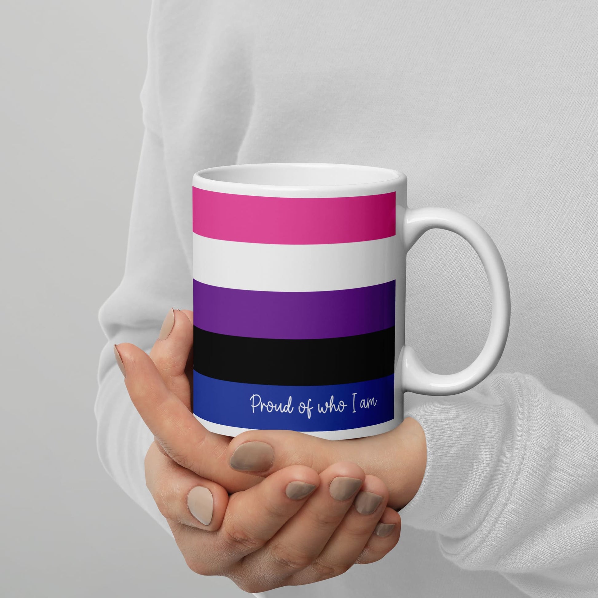 genderfluid coffee mug on hands