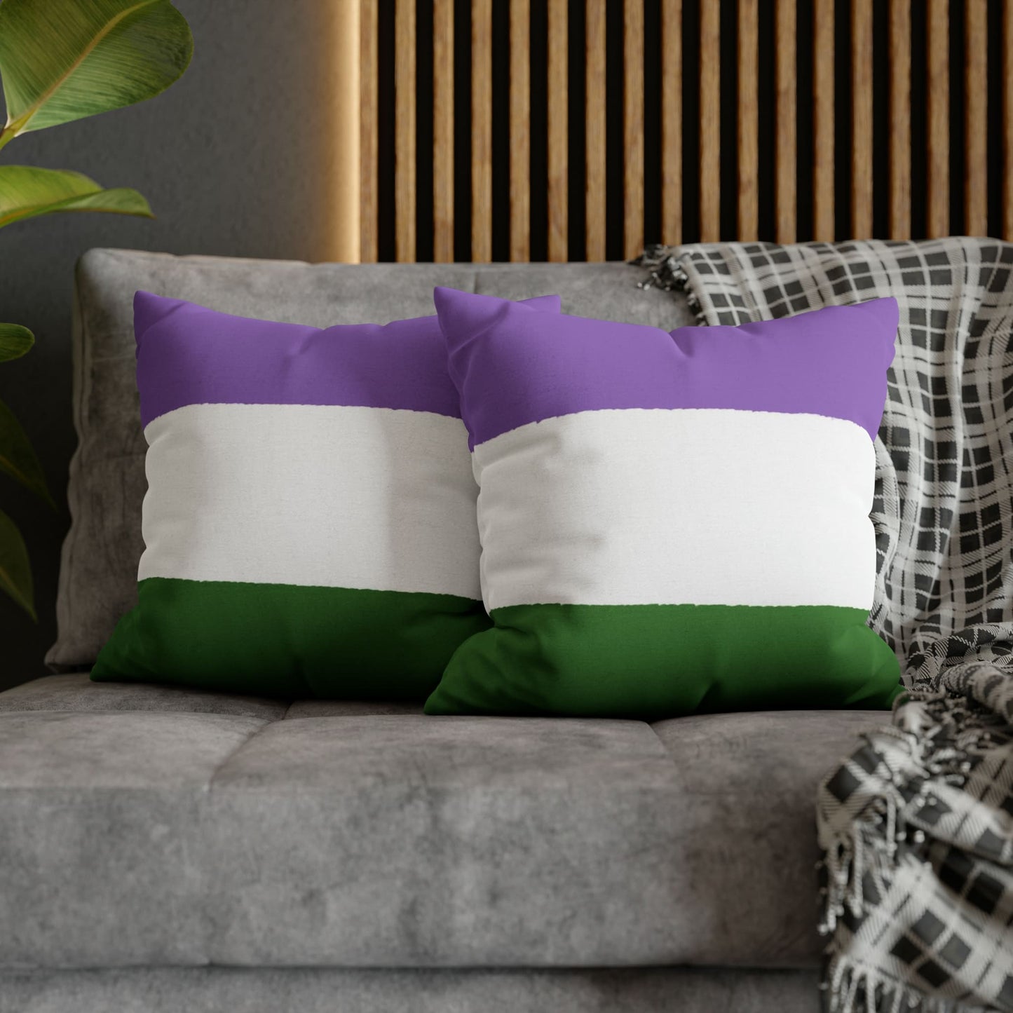 2 genderqueer pillows on couch