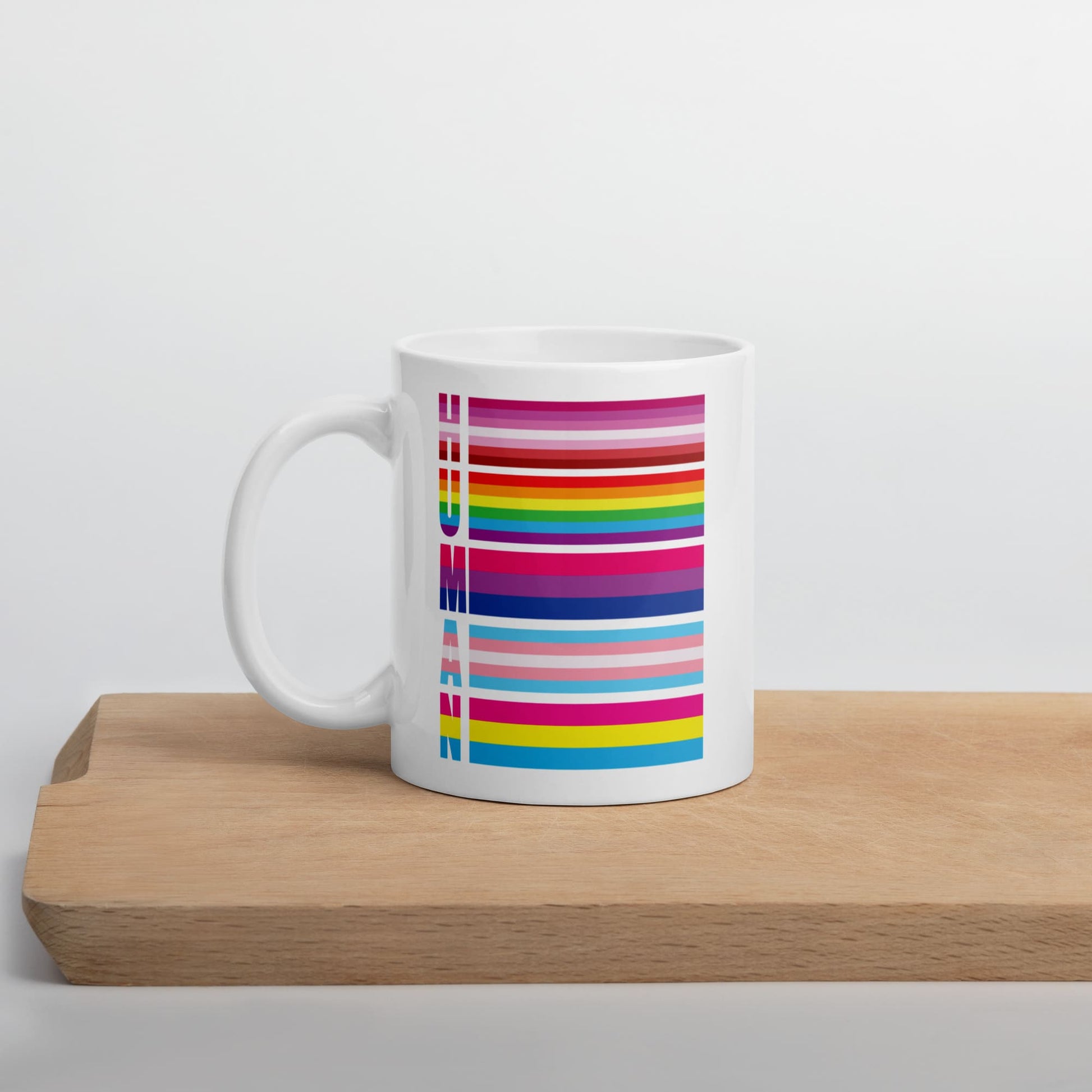 lesbian bisexual transgender pansexual mug, human LGBT pride coffee or tea cup on table