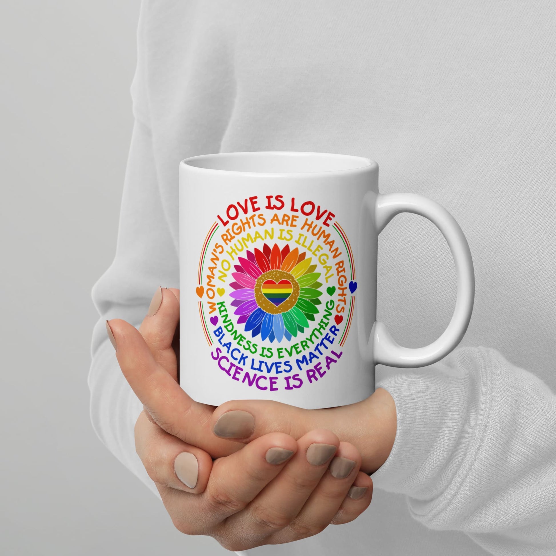 LGBTQ pride mug, human rights coffee or tea cup on hands