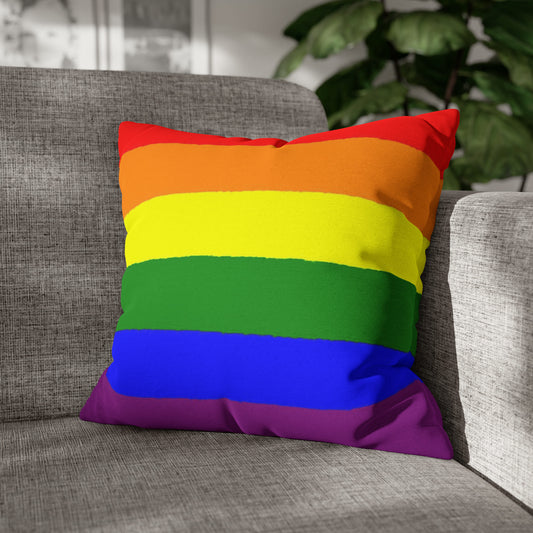 LGBTQ pride pillow on sofa