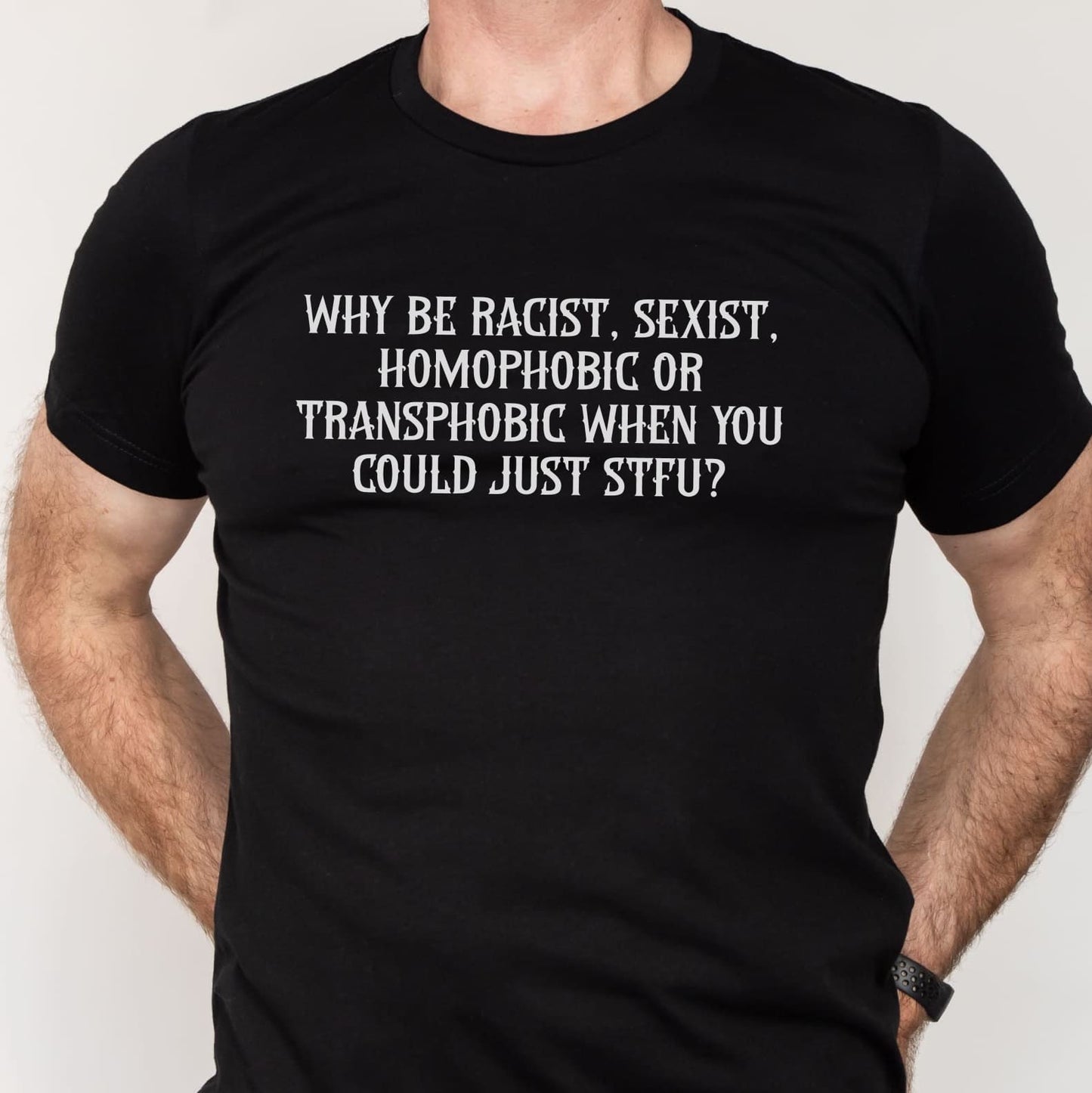 Black t-shirt with white text message on a plain background: LGBTQ Rights Shirt, Anti-Racism Equality Tee, Feminist Protest Top, Inclusive Pride T-Shirt, Human Rights Activist Shirt, Anti-Trump Gift