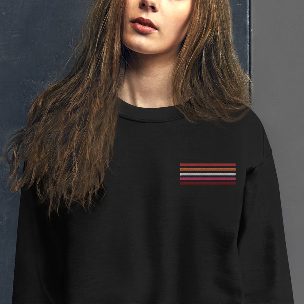 lesbian sweatshirt, subtle sunset flag embroidered pocket design sweater, model 1