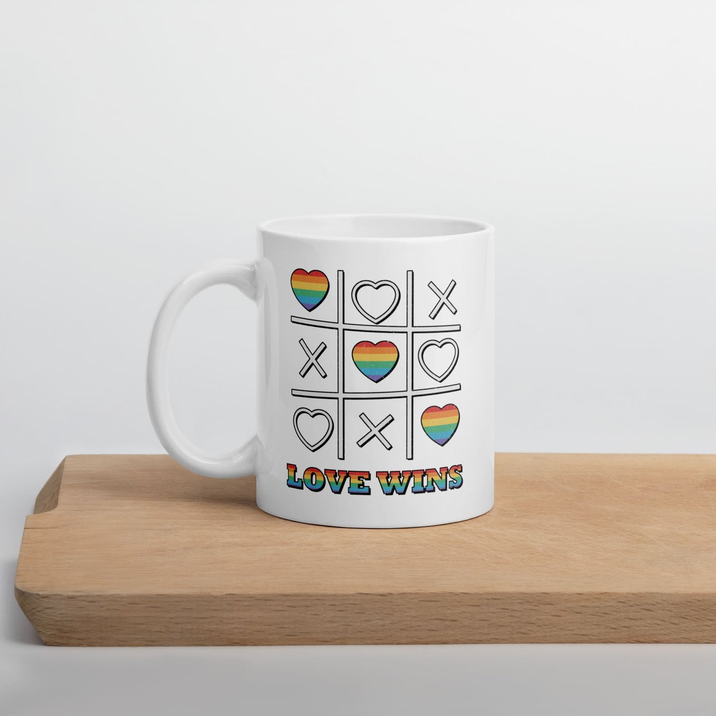 LGBT mug, love wins pride coffee or tea cup on table