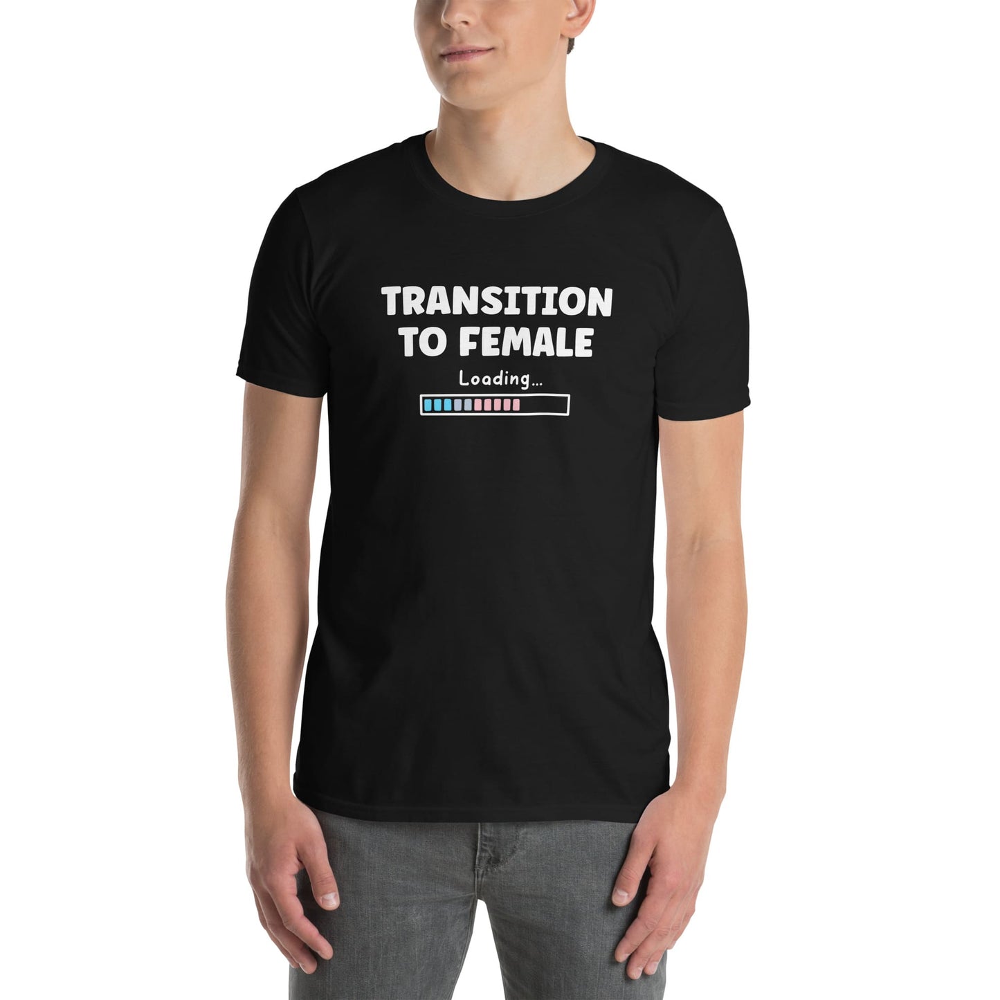 MTF transgender person wearing a black t-shirt with text 'Transition to Female Loading' on a white background