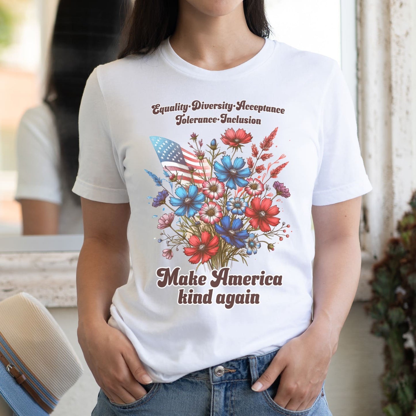 Person wearing a white t-shirt with a floral design and text about equality and kindness: Make America Kind Again Shirt, Kindness Patriotic Tee, Inspirational Human Rights T-Shirt, USA Diversity Shirt, Wildflowers Democrat Gift