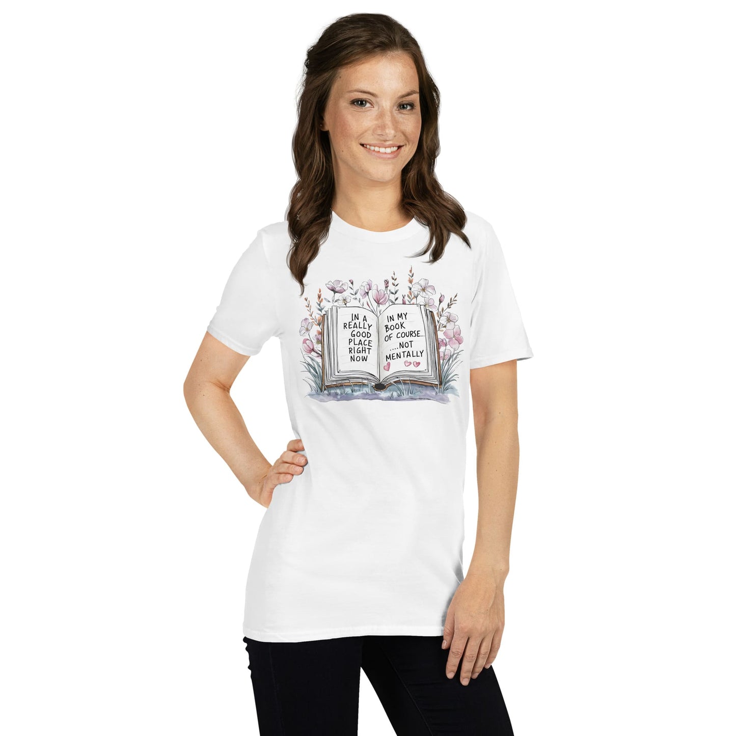 Woman wearing a white t-shirt with a bookish graphic design on a plain background