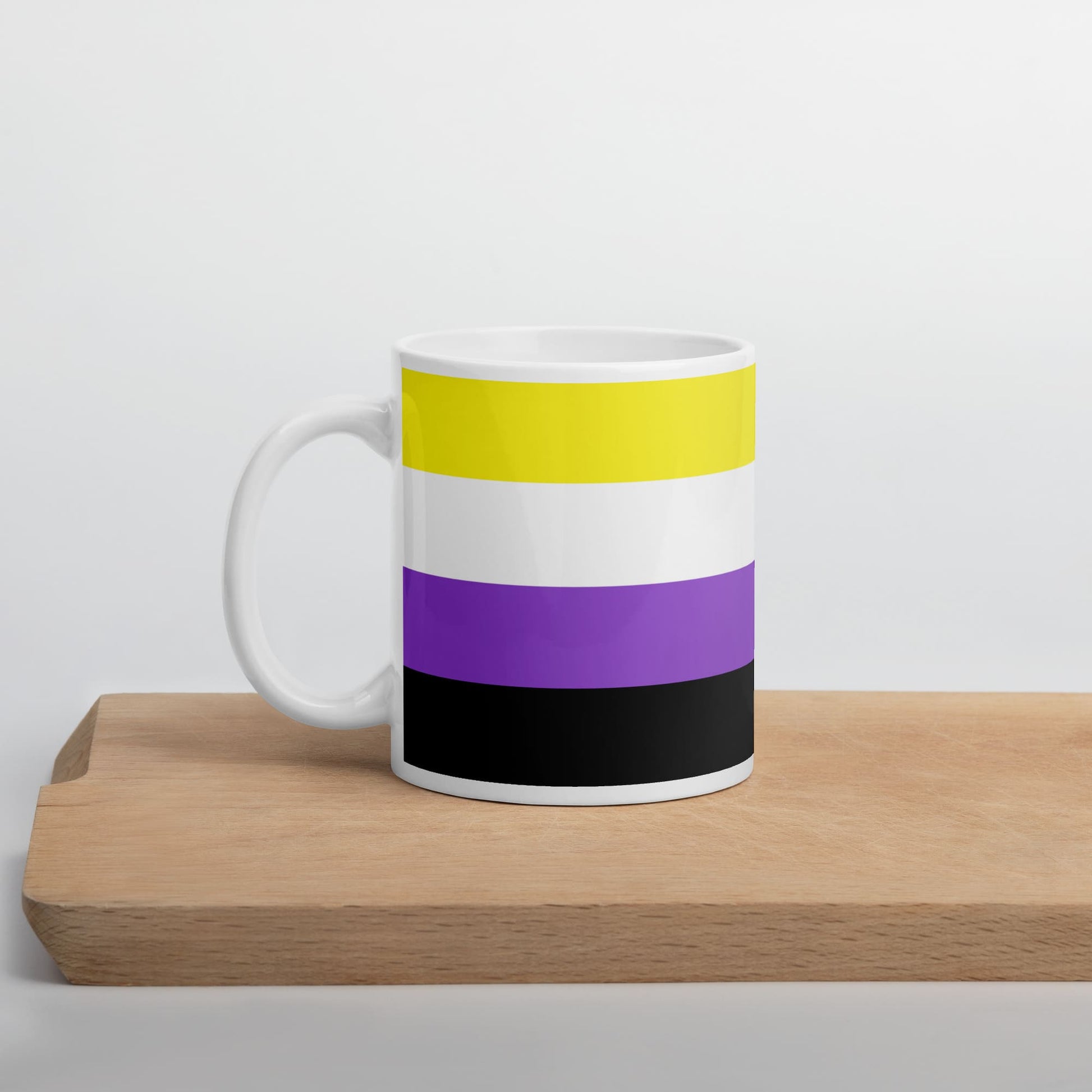 non binary coffee mug on table