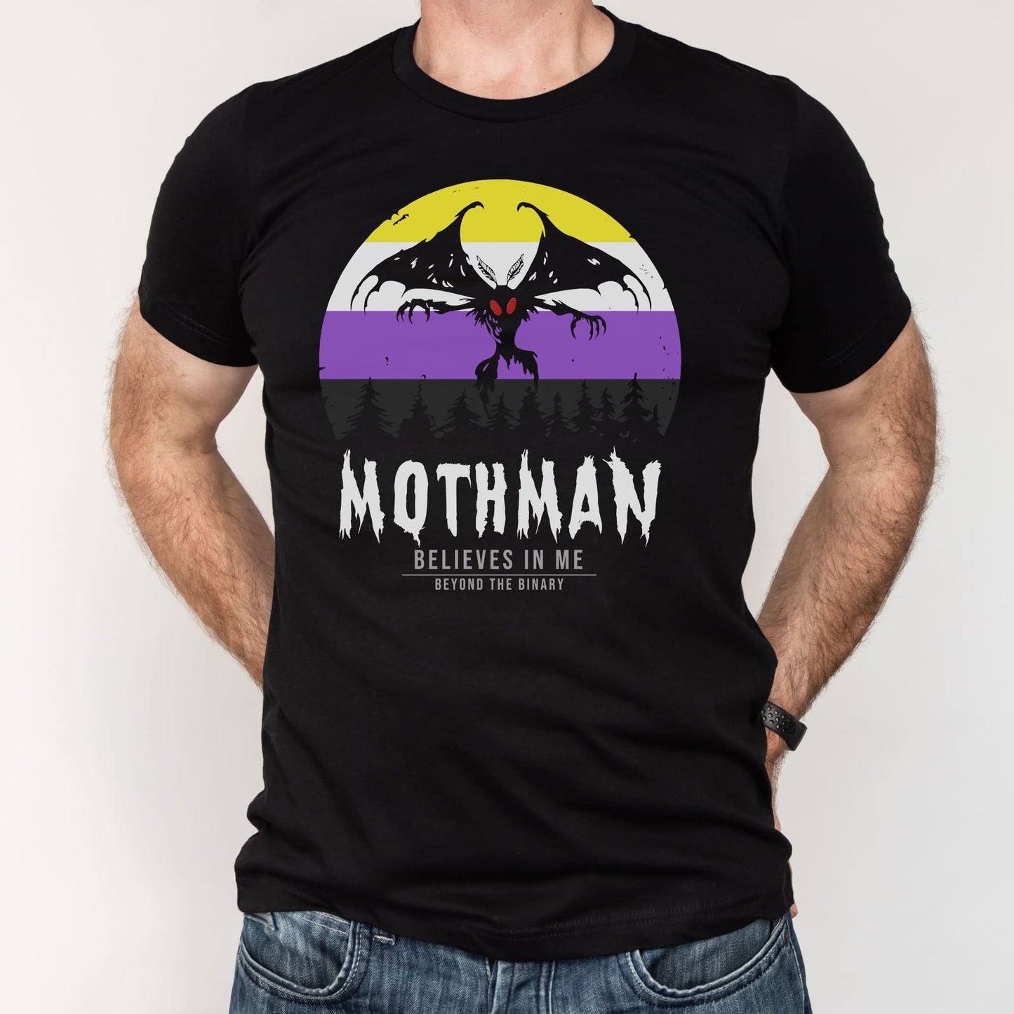 Black t-shirt with Mothman graphic and text on a white background: Nonbinary Mothman Shirt, Enby Pride Cryptid Folklore T-Shirt, Queer Mythology Legend Cryptozoology Tee, Cryptidcore Weirdcore Gift For LGBT