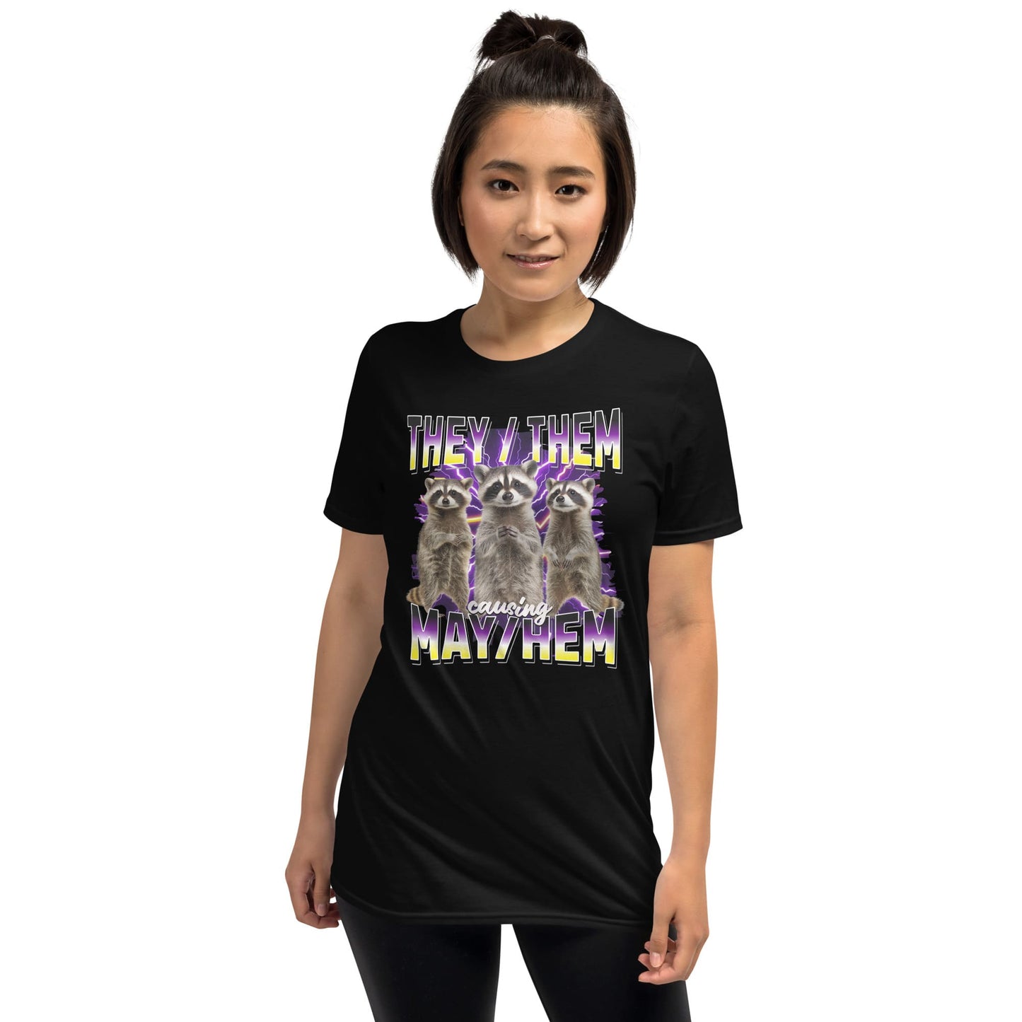 Person wearing a y2k black bootleg enby pride t-shirt with they them pronouns