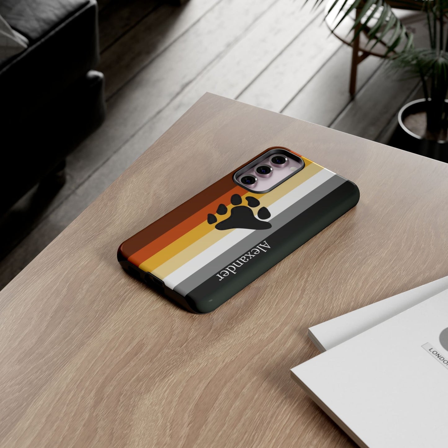personalised bear pride flag phone case, on table