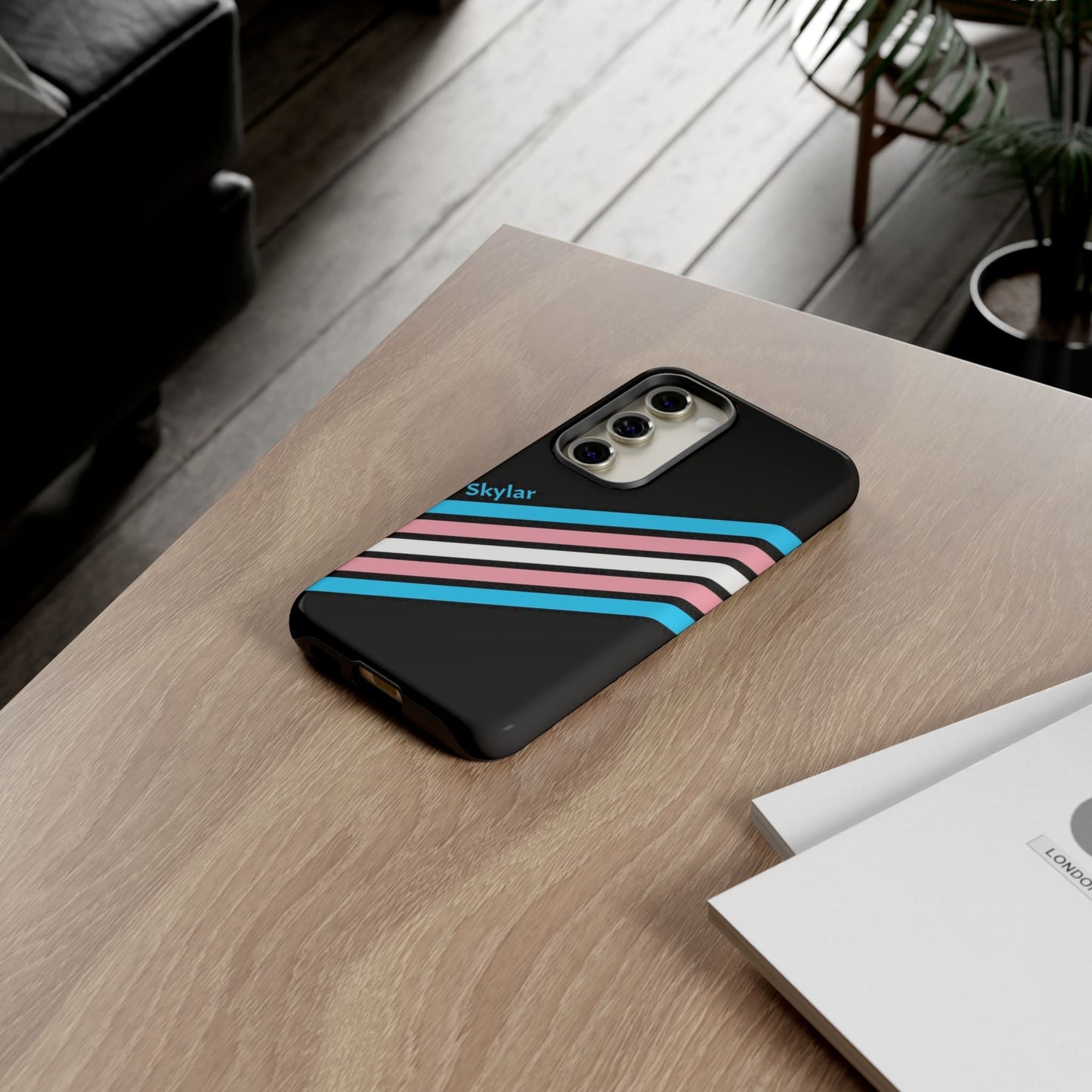 personalised transgender phone case, subtle trans pride, on table