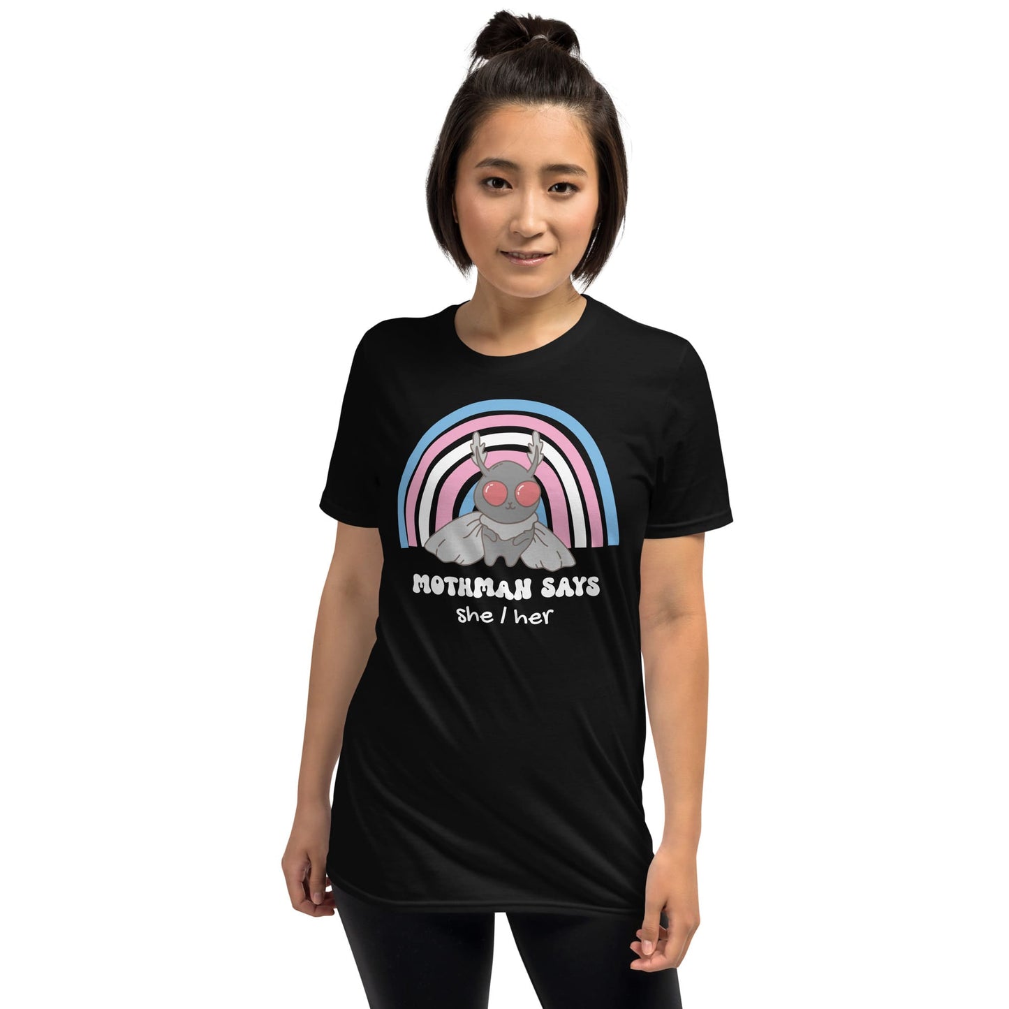 Person wearing a black t-shirt with a graphic design and text on a white background: Personalized Trans Mothman Shirt, Custom Pronouns Transgender Pride Cryptid Tee, Folklore Mythology TShirt, Queer Cryptozoology FTM FTM Gift