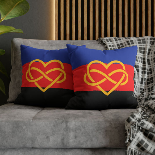 2 polyamory pillows on couch