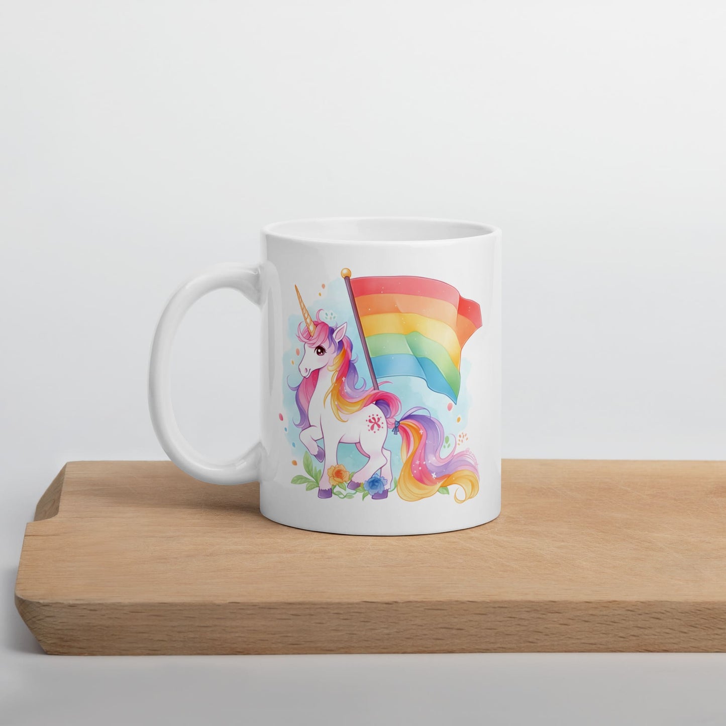 LGBTQ mug, cute rainbow unicorn coffee or tea cup on table