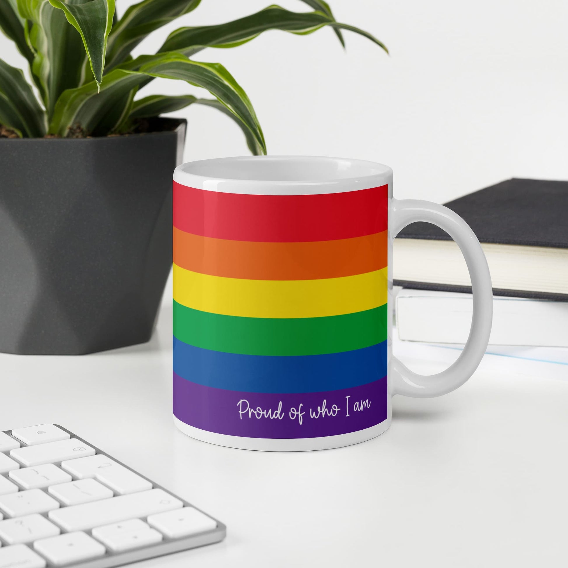 progress pride coffee mug on desk