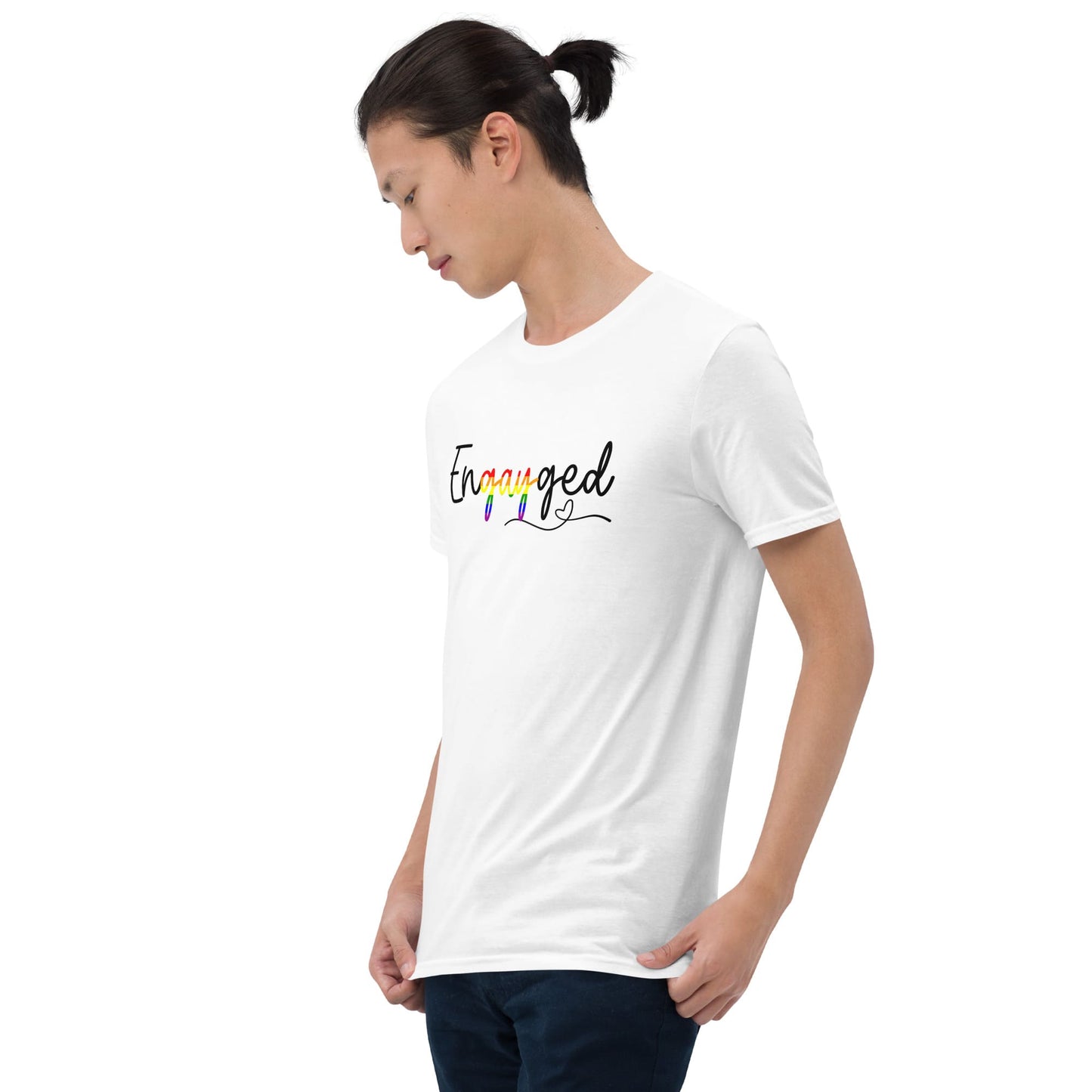 queer person wearing wedding announcement a white t-shirt with rainbow 'engayged' on a white background