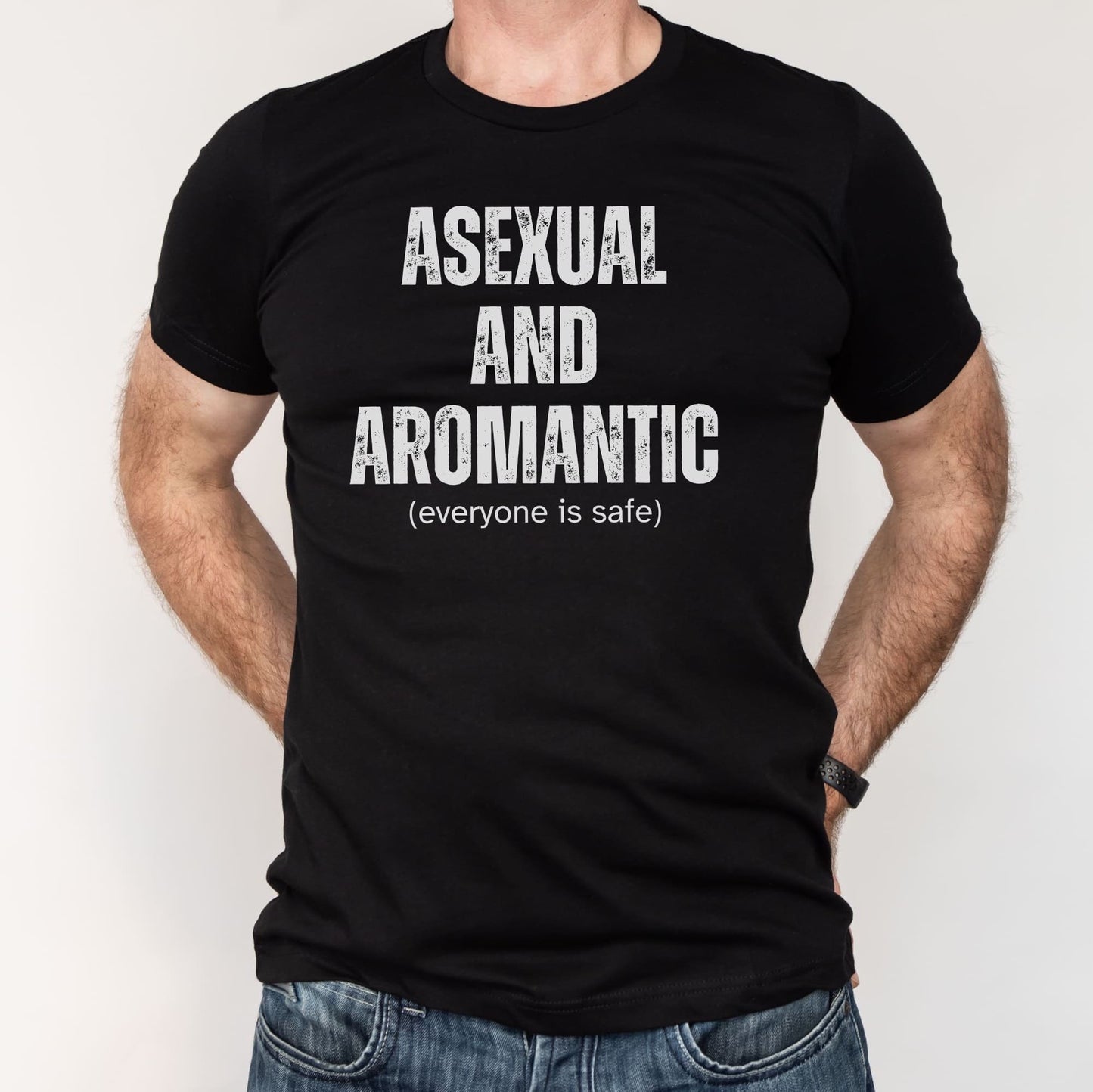 Black t-shirt with 'Asexual and Aromantic (everyone is safe)' text worn by a person on a white background