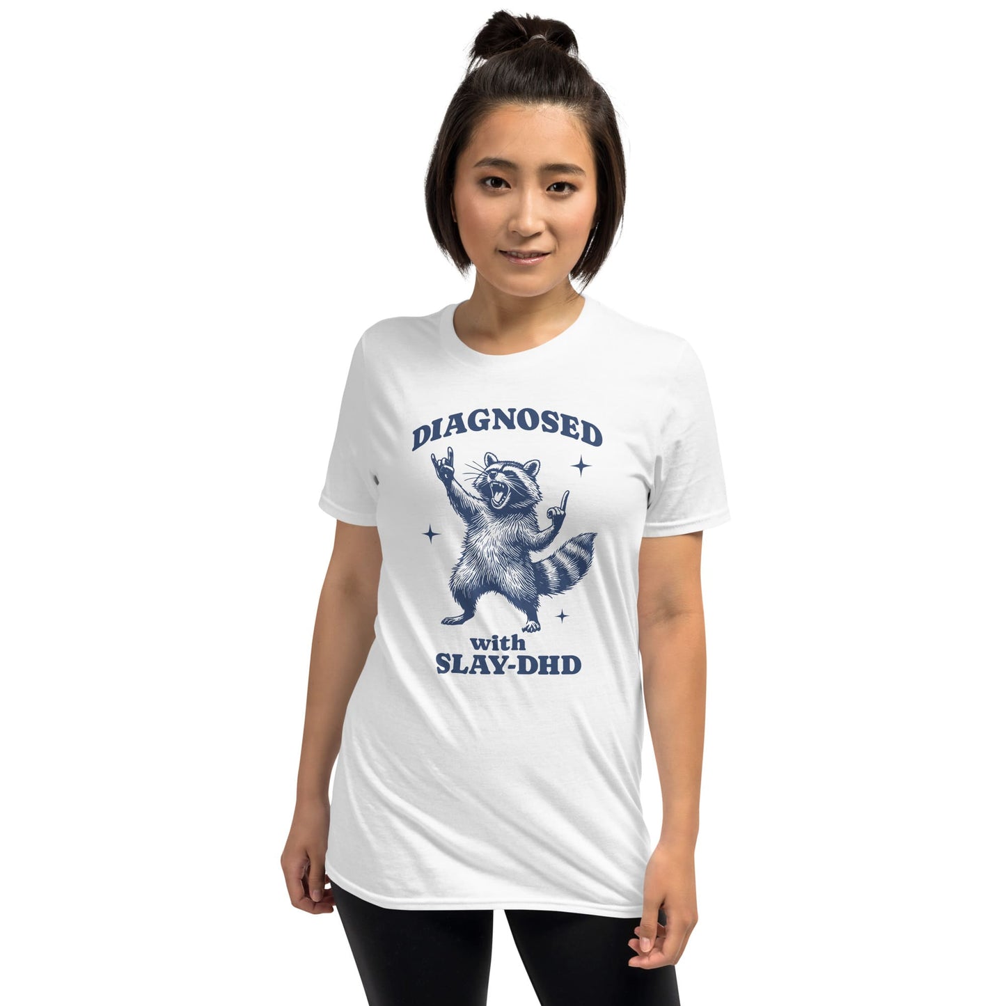 Person wearing a white t-shirt with a graphic and text on a white background: Funny ADHD Shirt, Unhinged Raccoon Tee, Dumb Y2K meme Neurodivergent T-Shirt, Neurospicy Gift For AuDHD, Mental Health Awareness