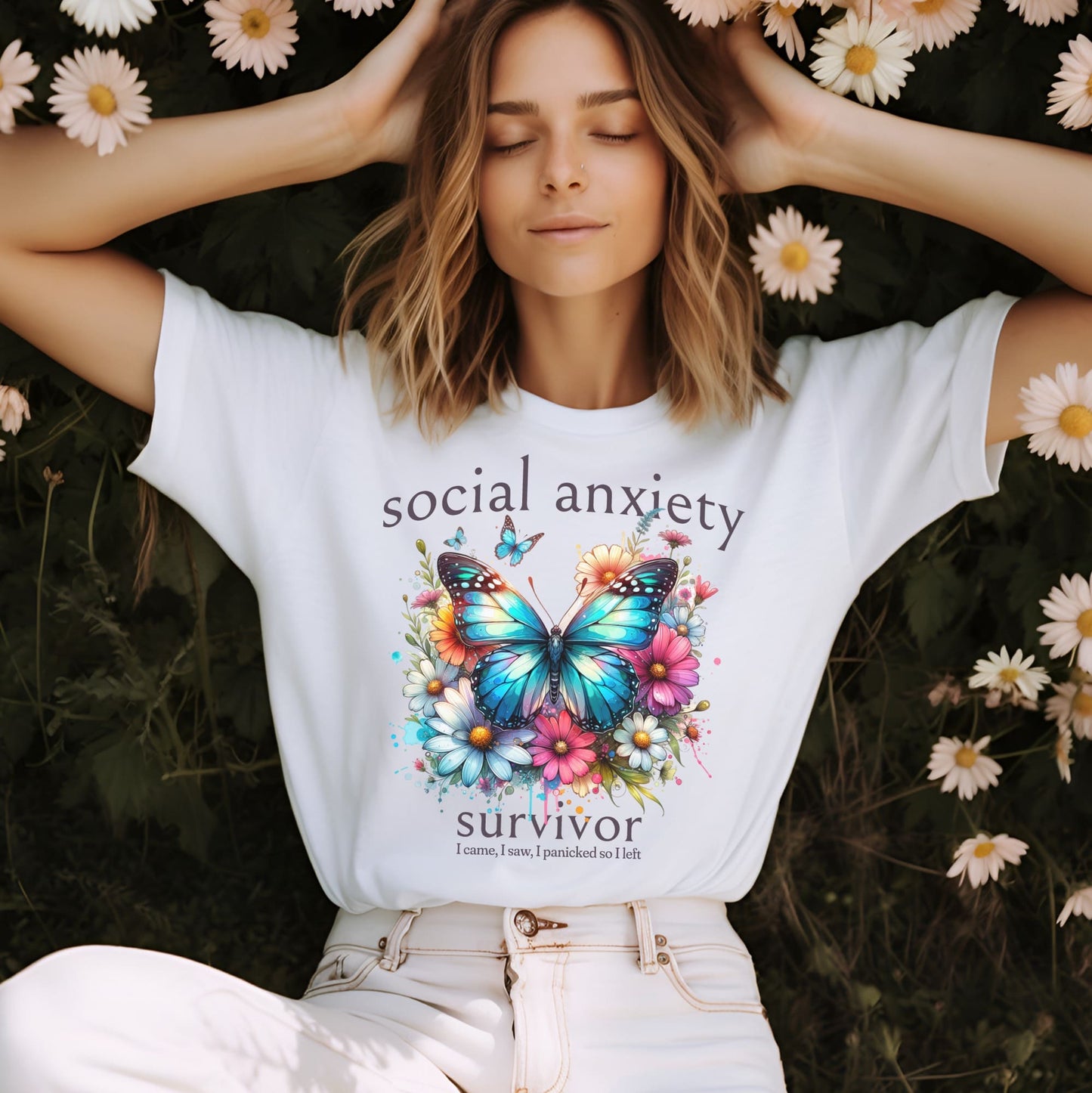Person wearing a white t-shirt with a butterfly design and text, surrounded by flowers: Social Anxiety Shirt, Funny Socially Awkward Tee, Wildflowers Butterfly Neurodivergent T-Shirt, Neurospicy Gift For Autistic, Mental Health Gift