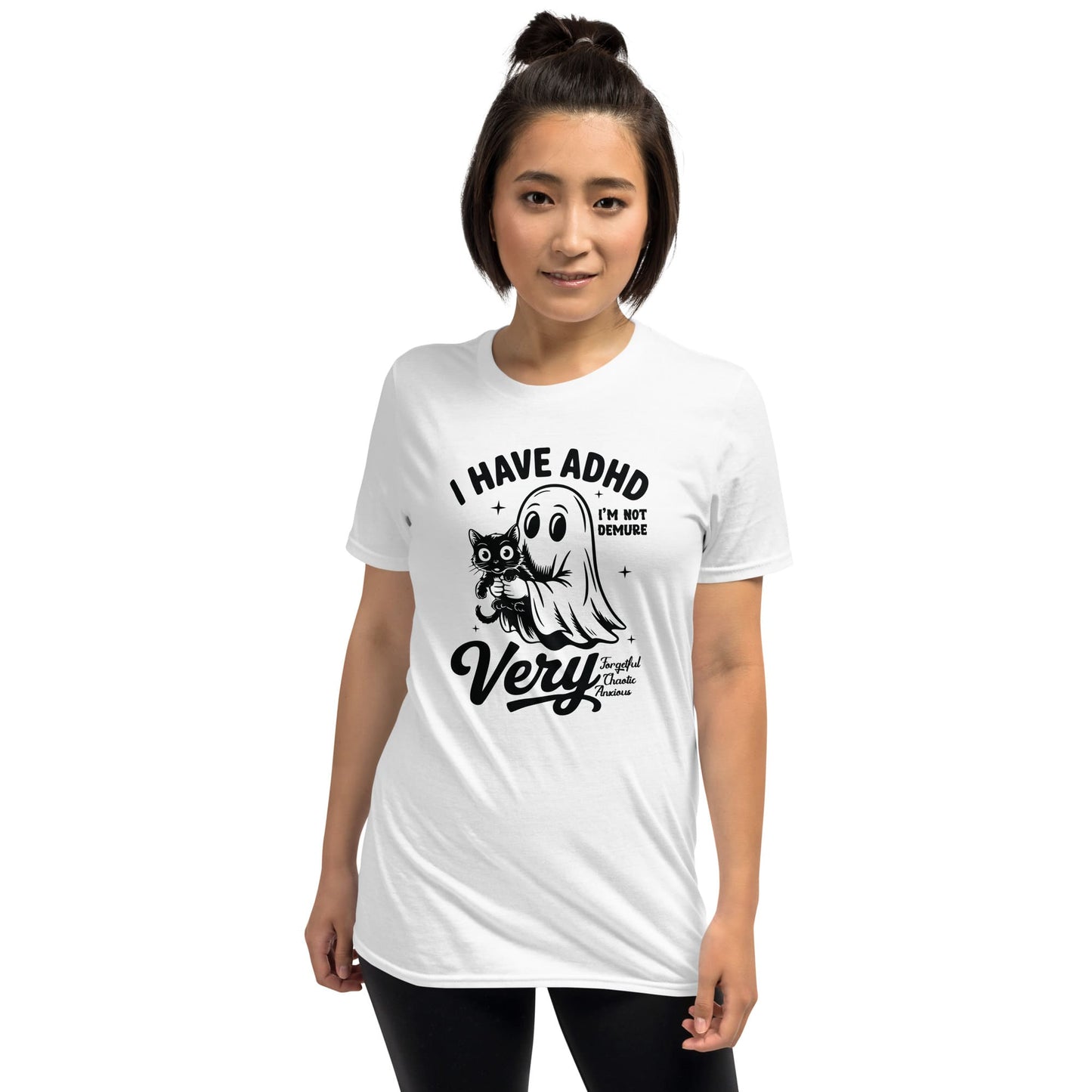 Person wearing a white t-shirt with a graphic design and text on a white background: Spooky ADHD Shirt, Funny Neurodiversity Halloween Tee, Neurospicy Gift For AuDHD, Mental Health Awareness Tshirt, Cute Neurodivergent Ghost